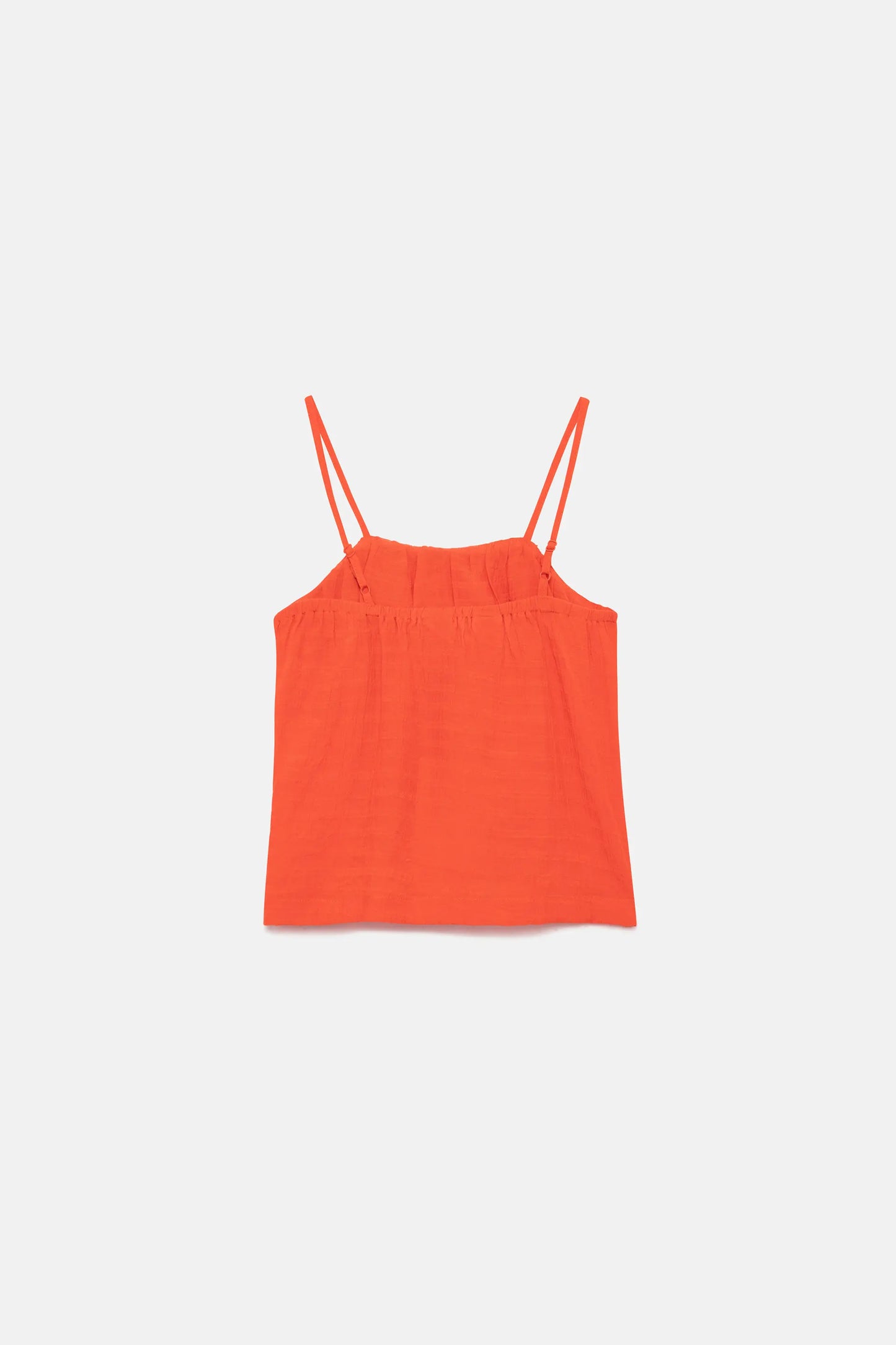 Top arancione senza spalline da bambina
