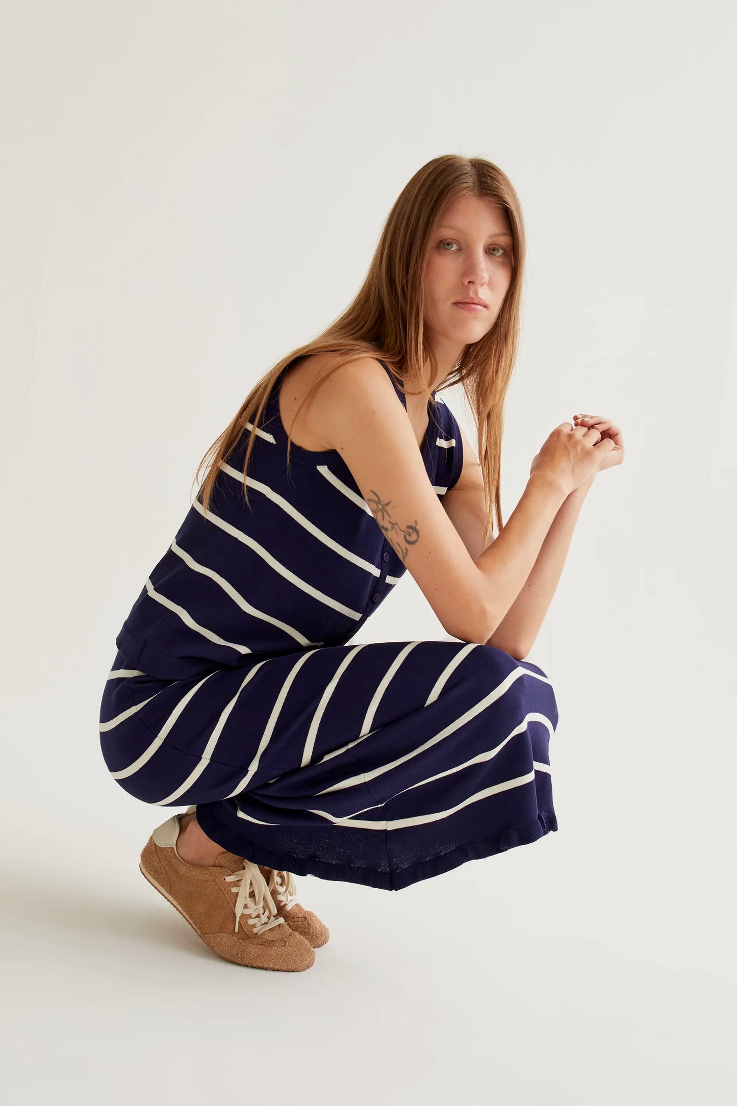 Navy and white striped knit midi skirt