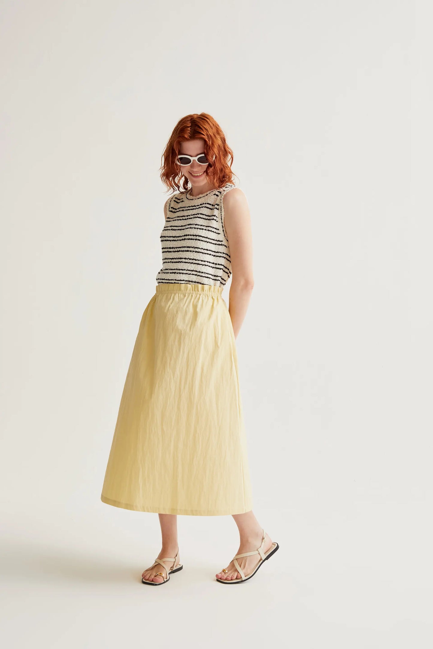 Falda midi amarillo claro