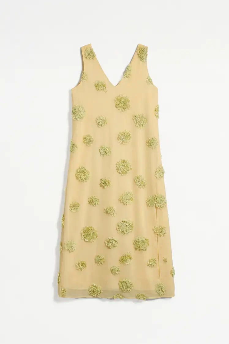 Vestito lungo giallo con dettaglio floreale