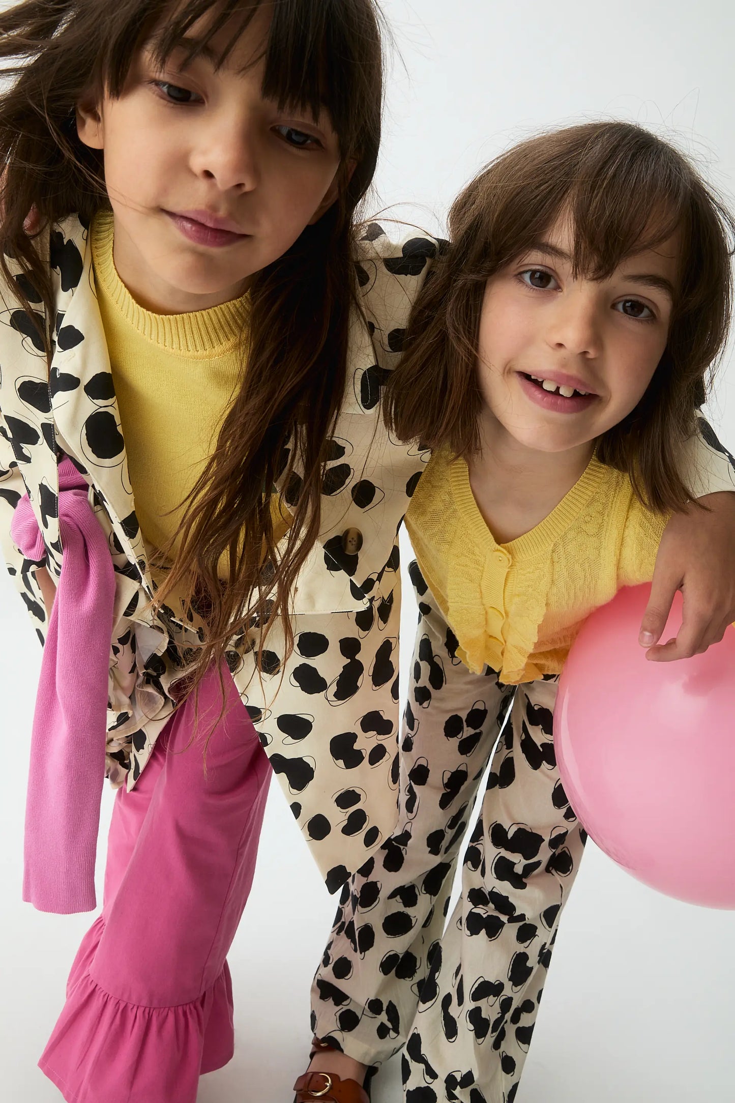 Girl's trench coat with Dalmatian print