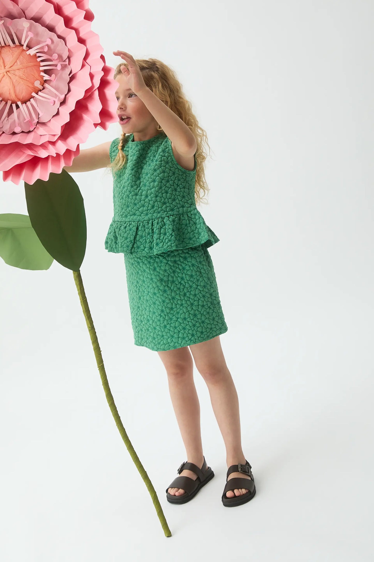 Girl's short skirt with green floral print
