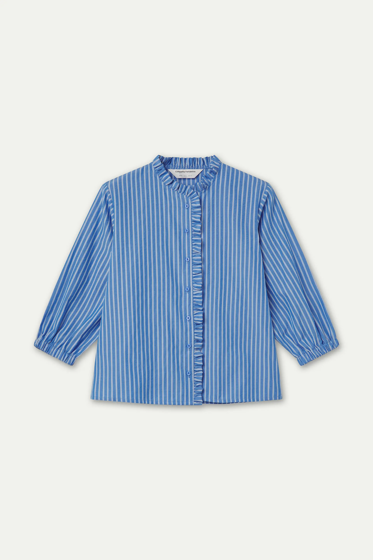 Camisa de rayas azul con detalle de volantes