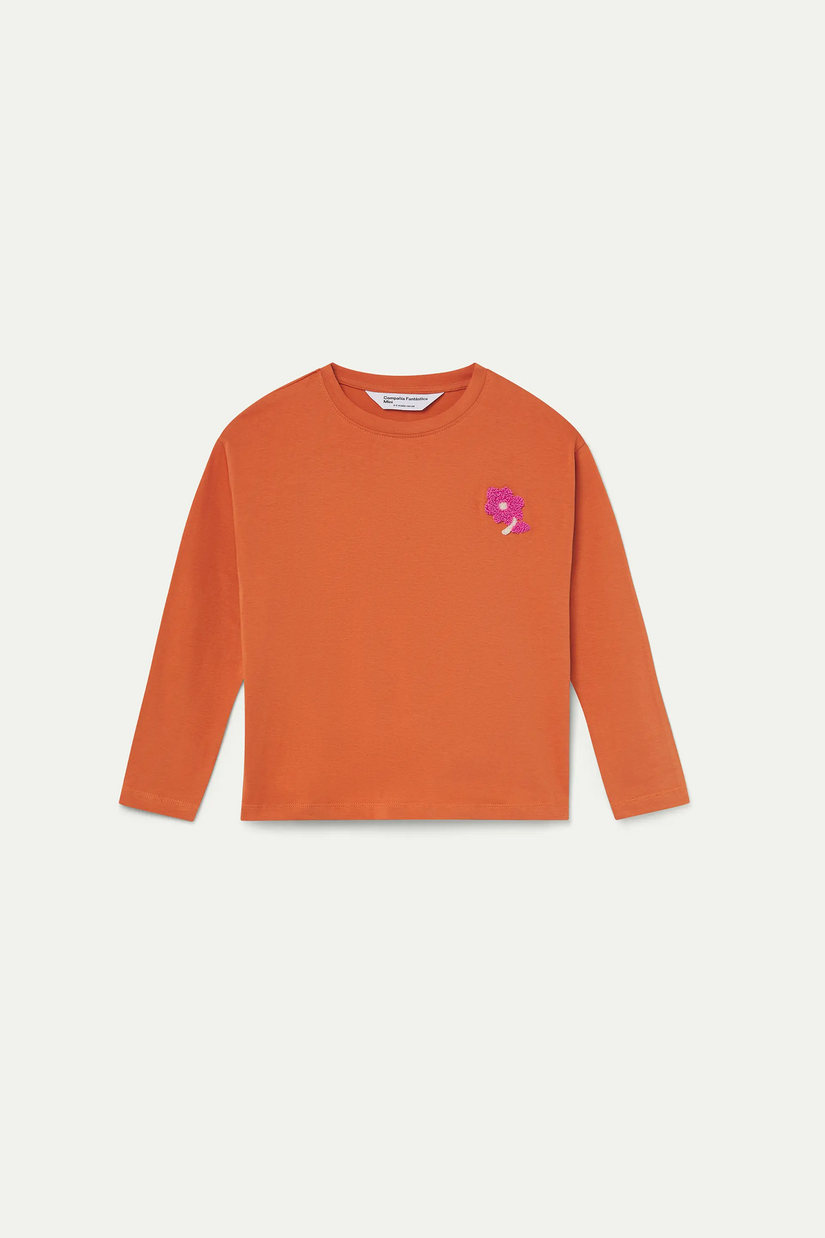 Camiseta de niña 100% algodón con aplique de flor rosa