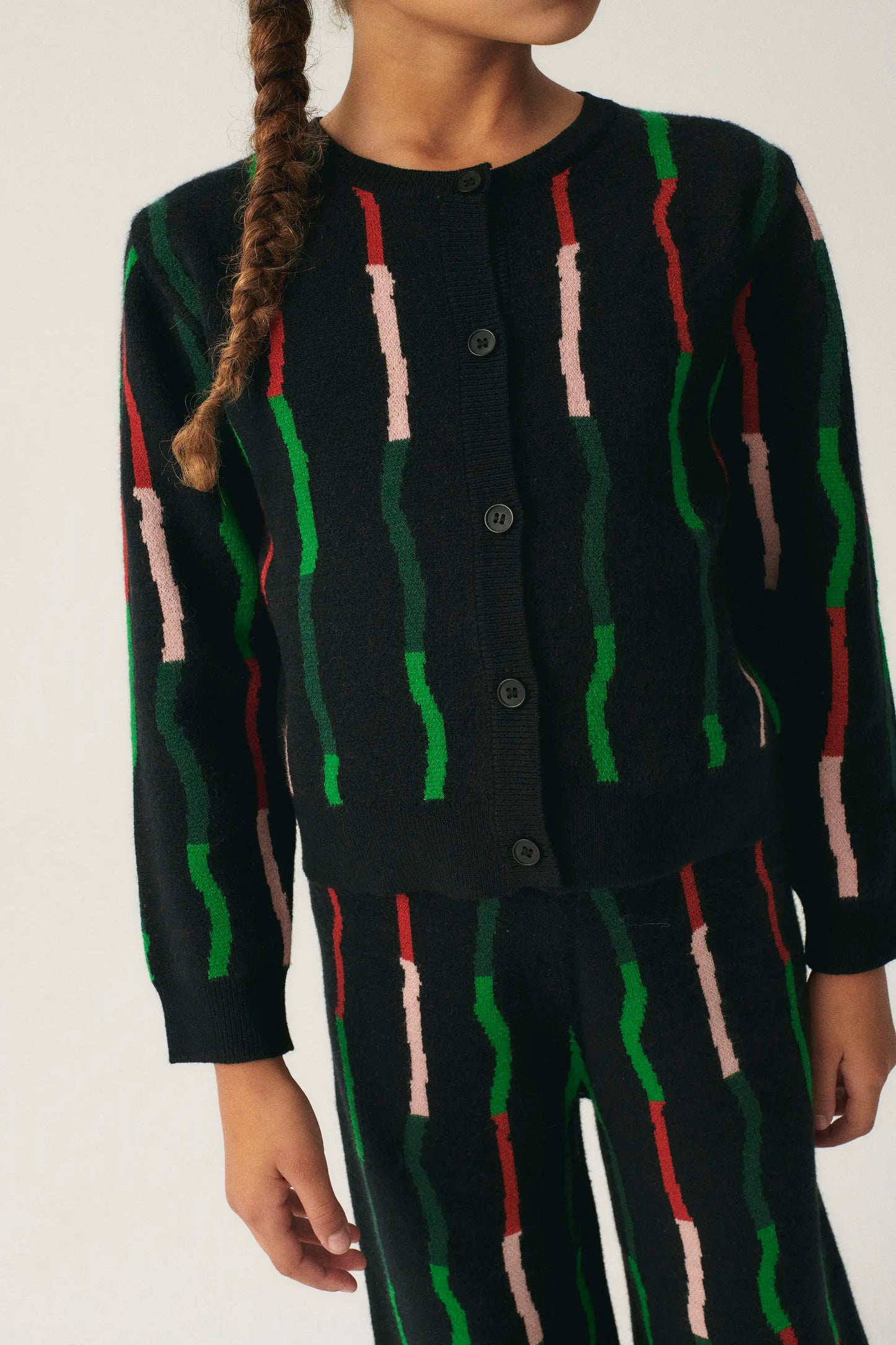 Girl's cardigan with black striped print