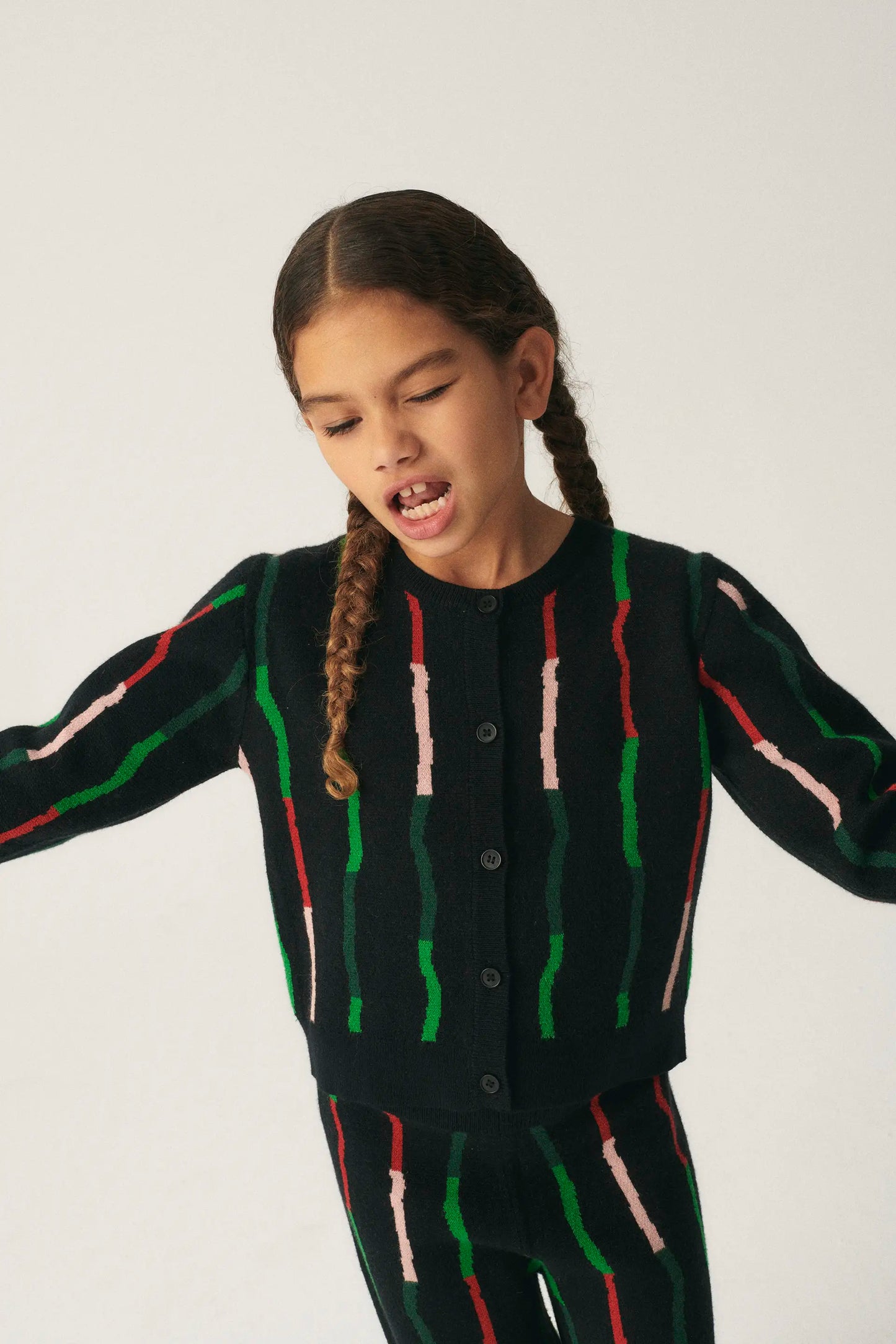 Girl's cardigan with black striped print