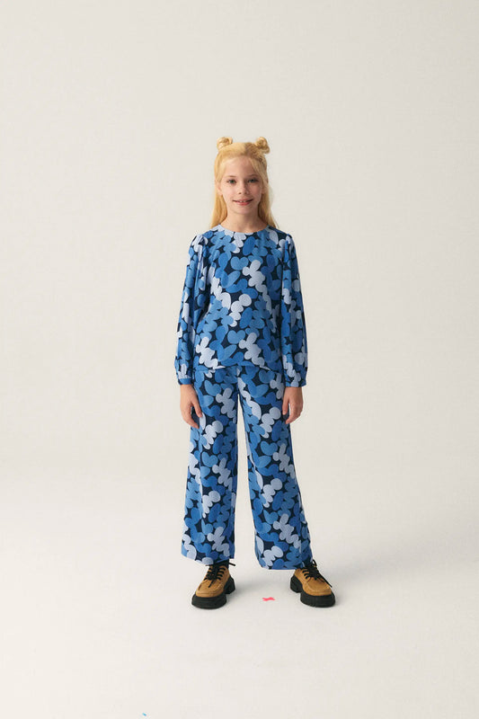 Top de niña con manga larga y estampado abstracto azul