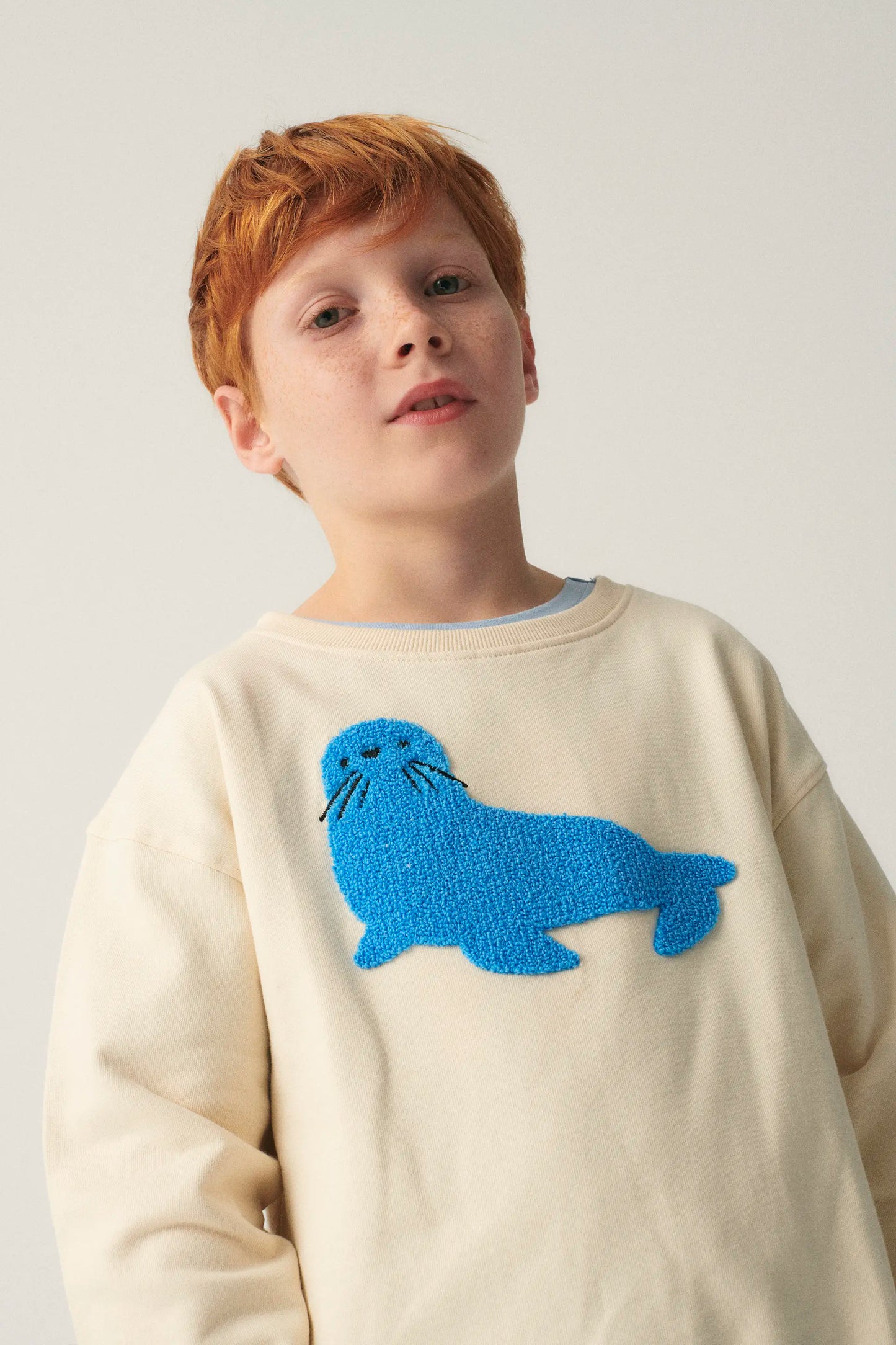 Unisex Plush Seal Graphic Sweatshirt