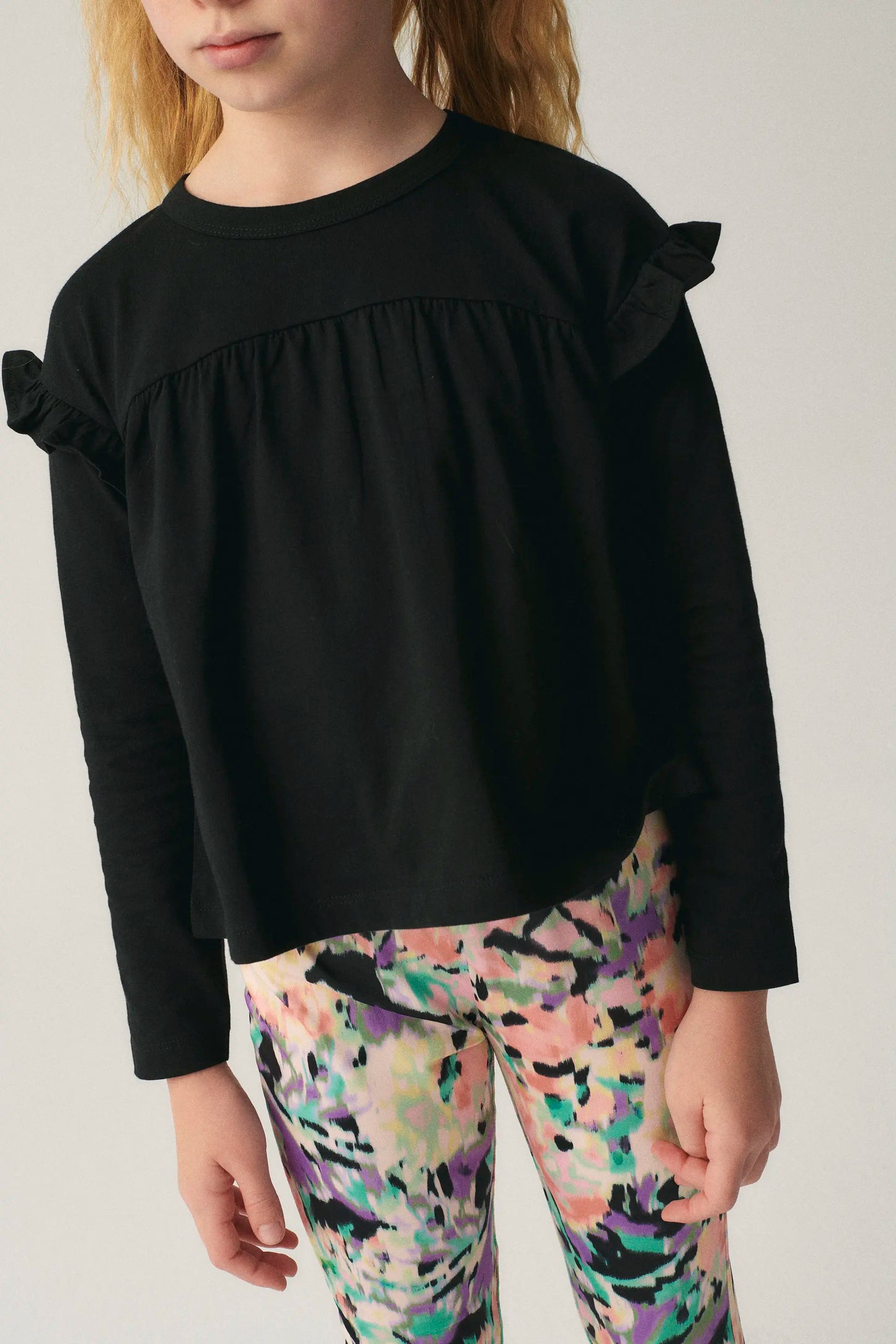 Top de niña con volantes negro
