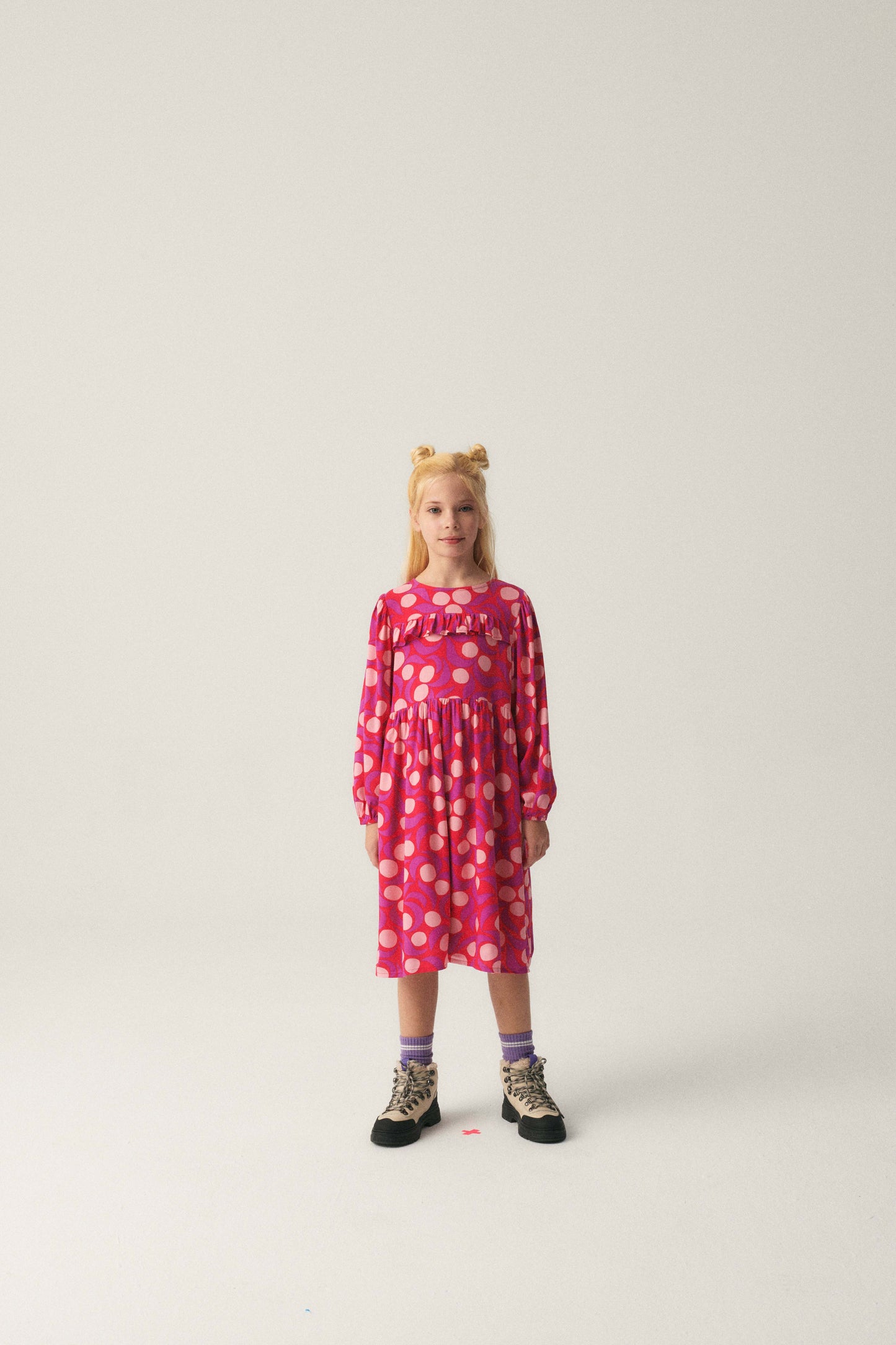 Girl's midi dress with ruffle and pink fantasy print