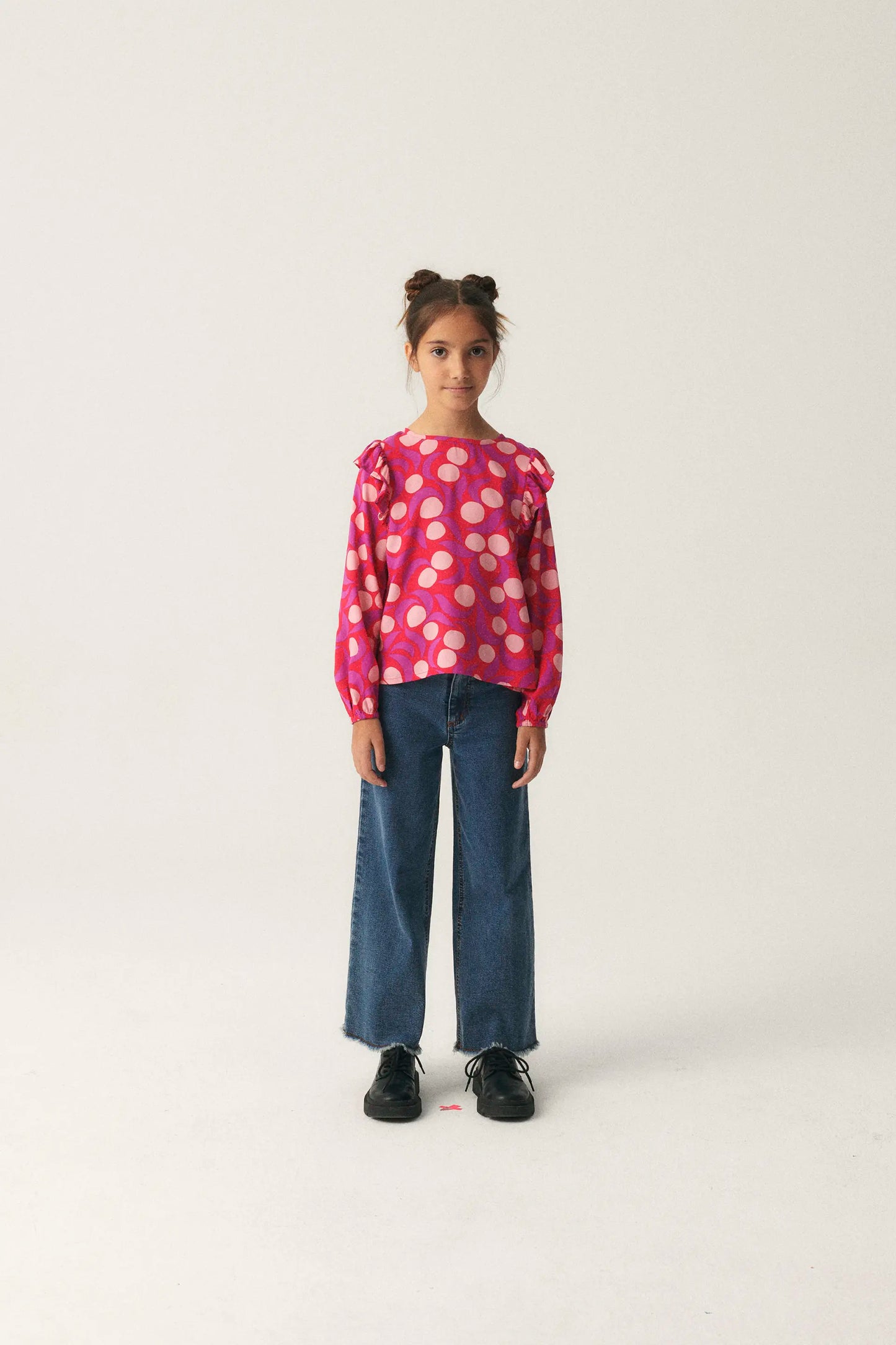 Top de niña con volantes y estampado fantasía rosa