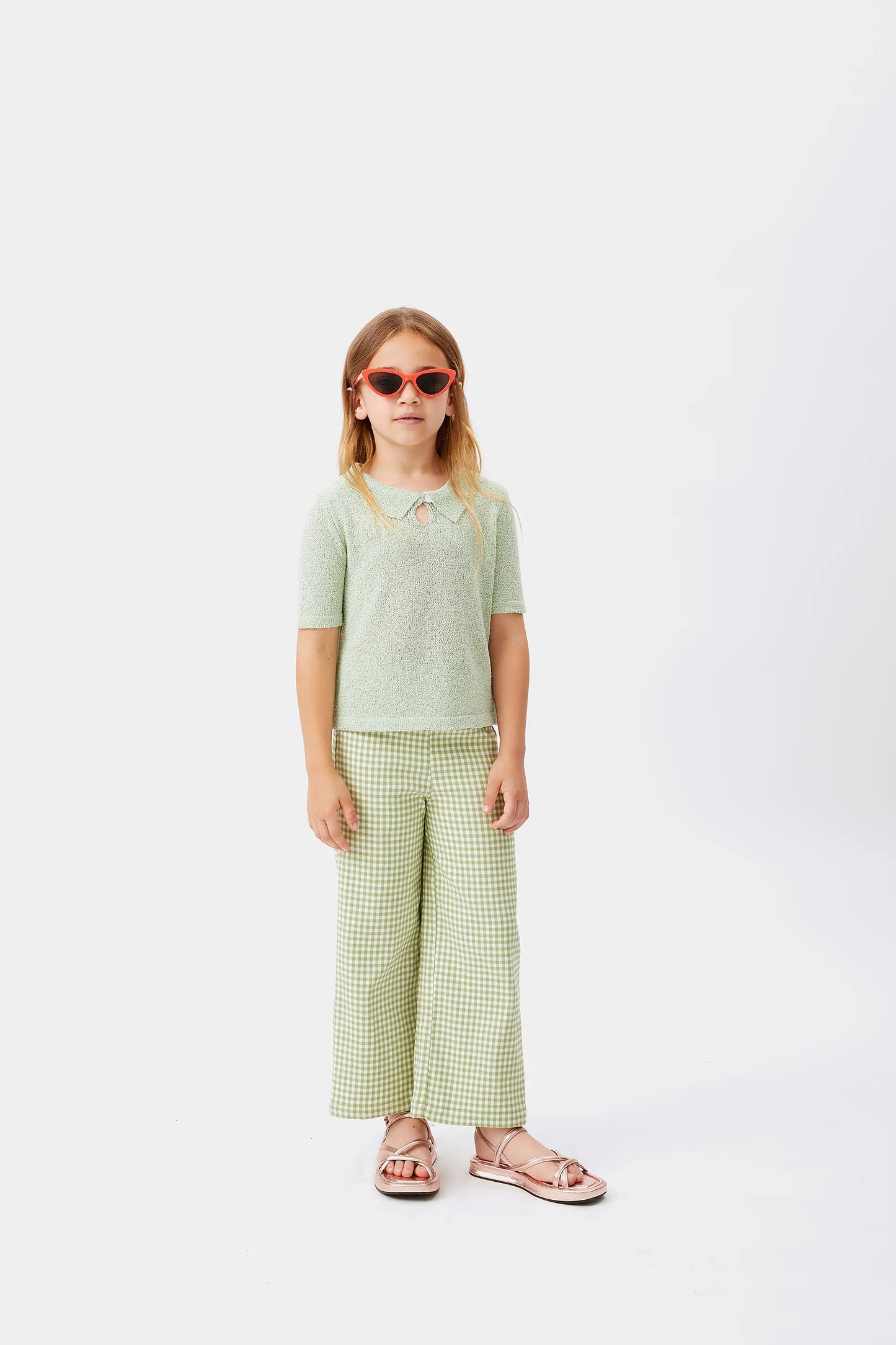 Girl's green polo neck sweater