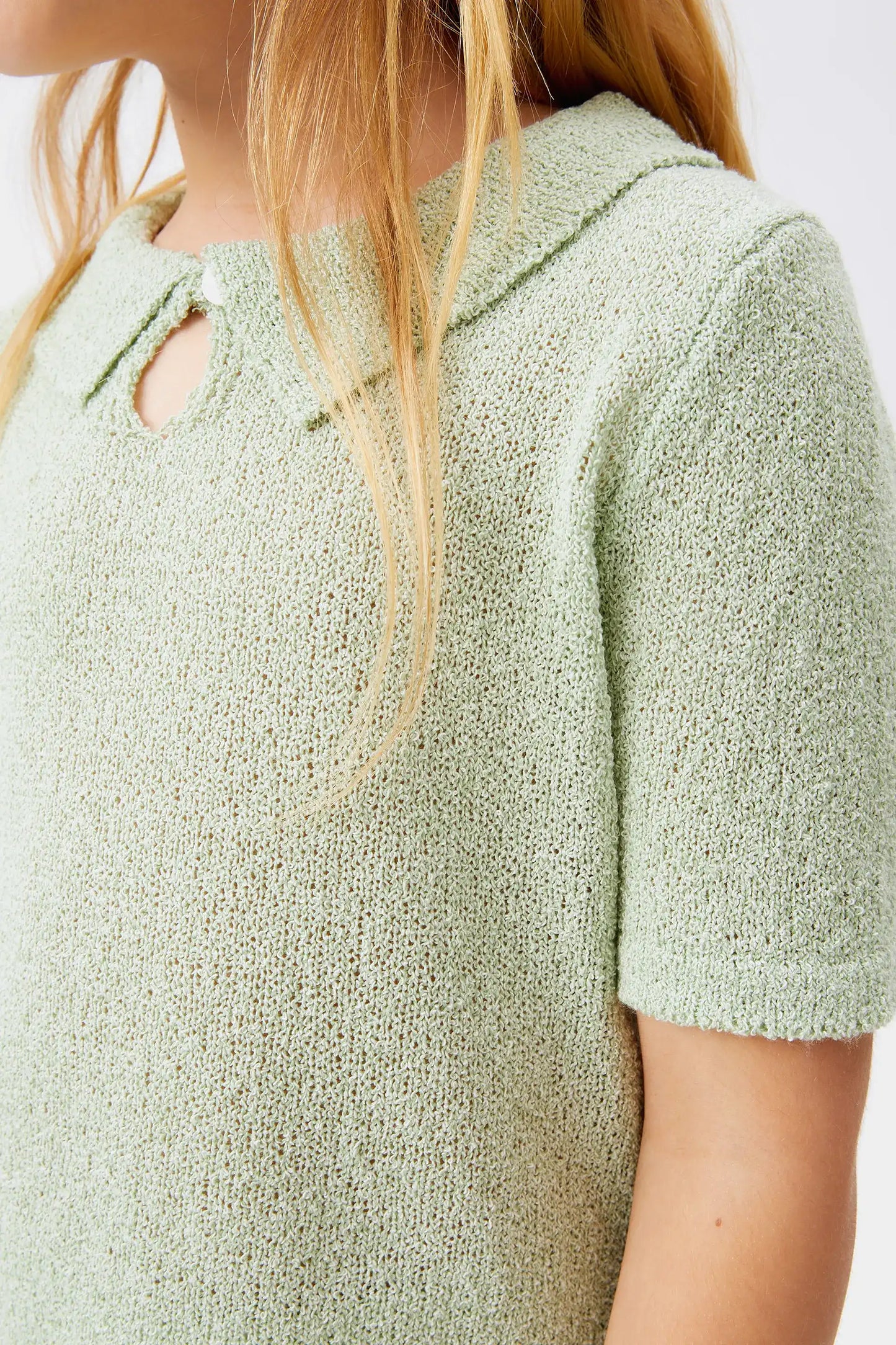 Girl's green polo neck sweater