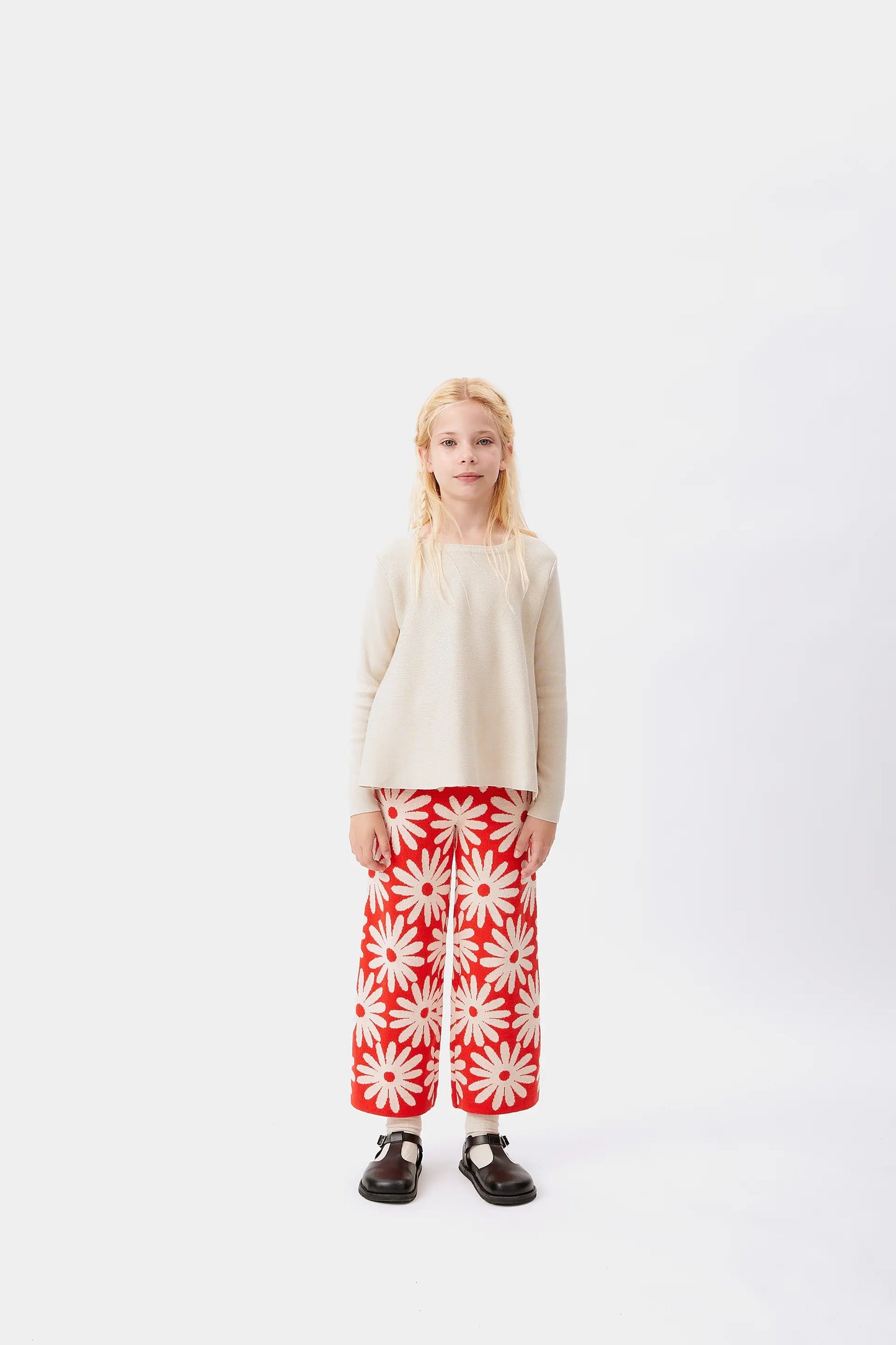 Girl's white flared sweater