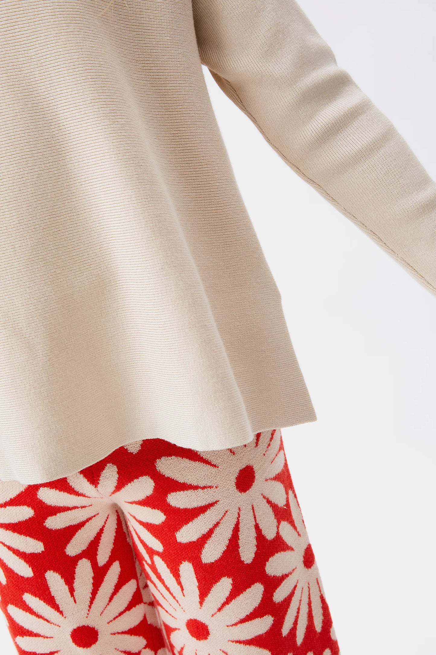 Girl's white flared sweater