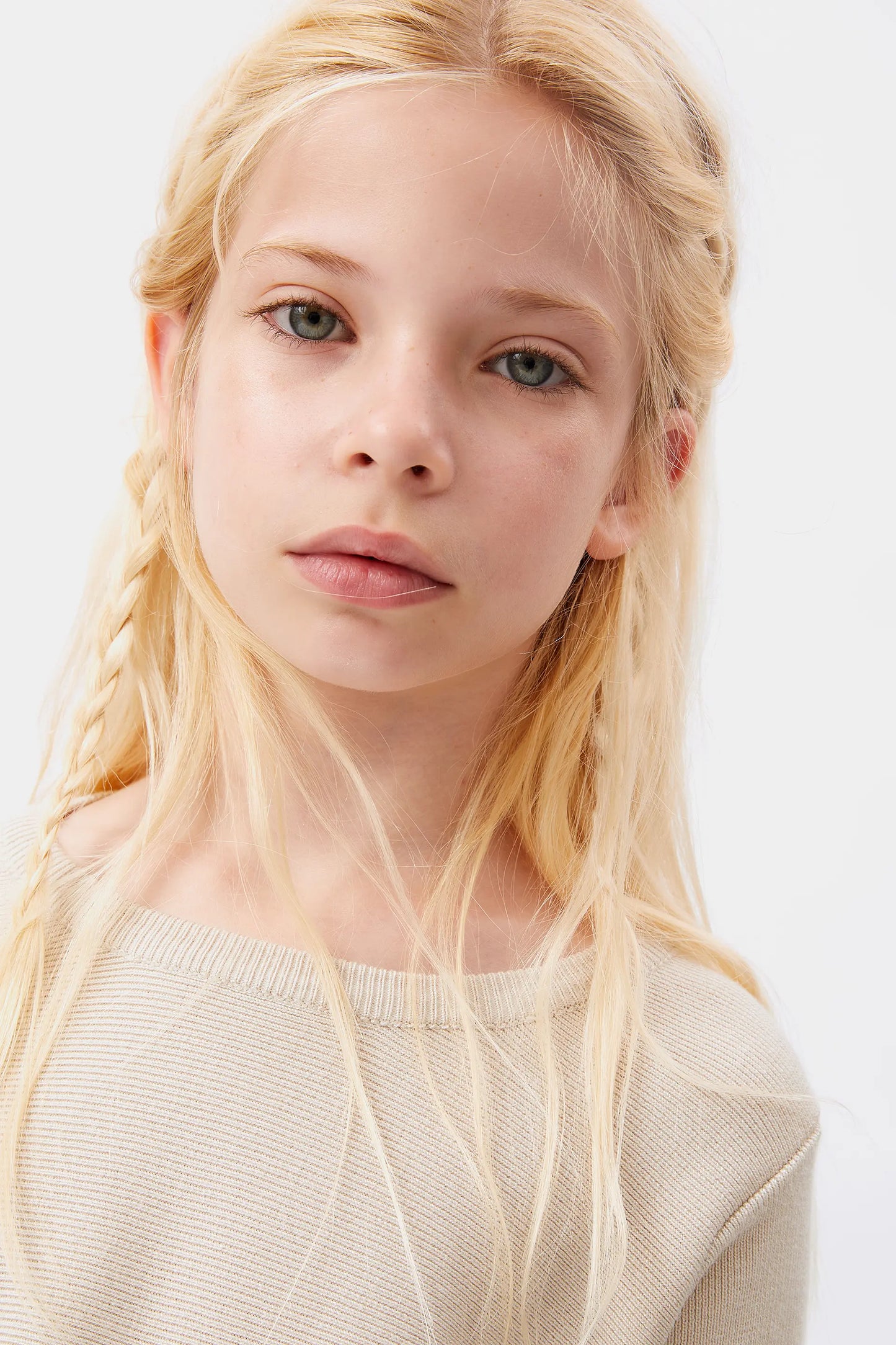 Girl's white flared sweater
