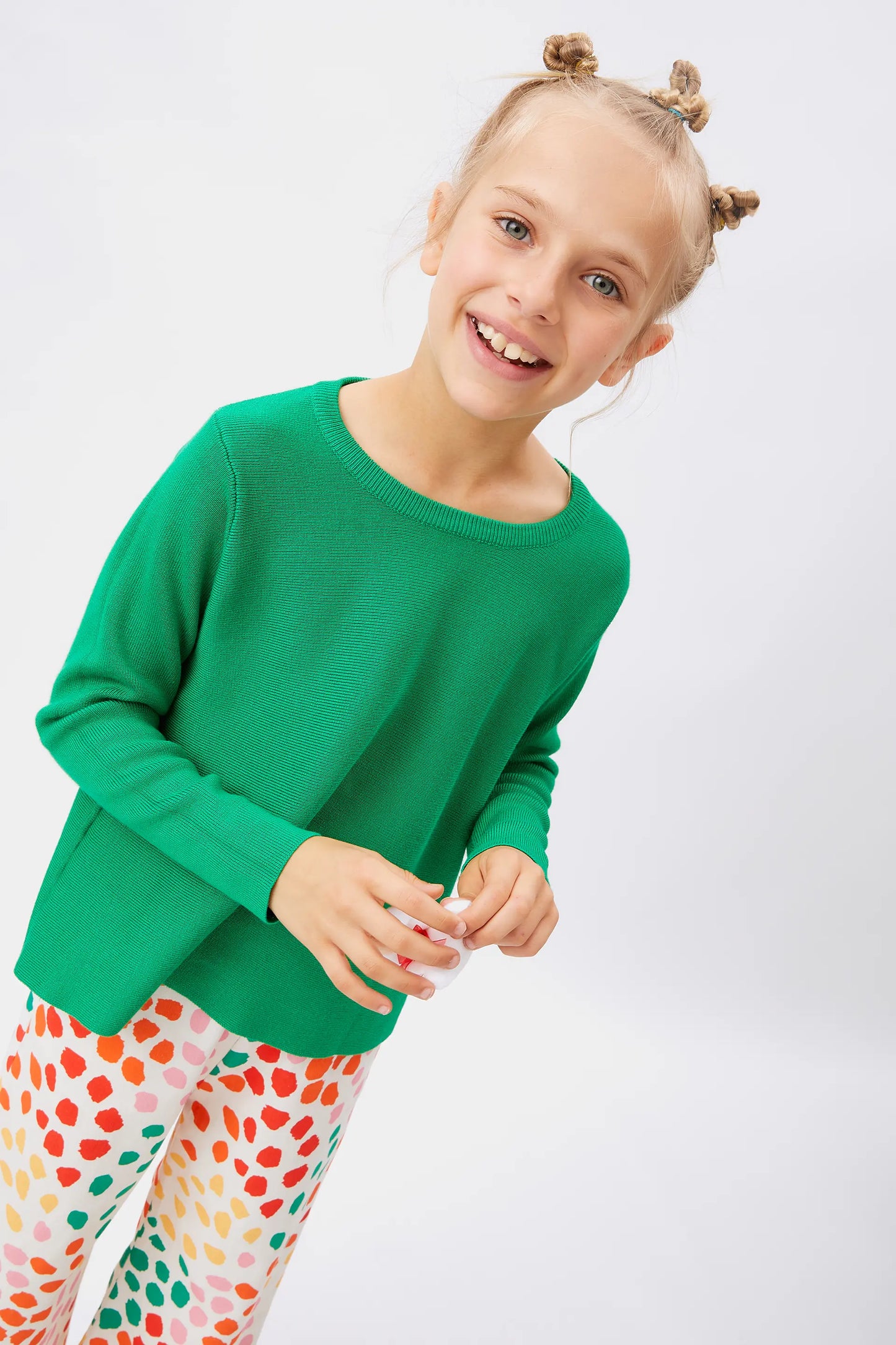 Girl's green flared sweater