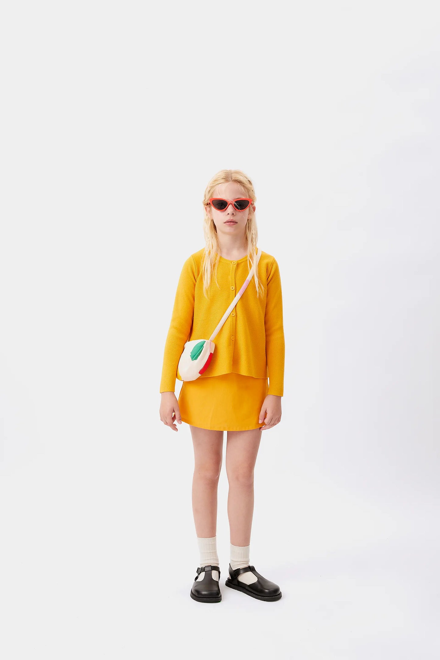 Cárdigan de niña evasé amarillo