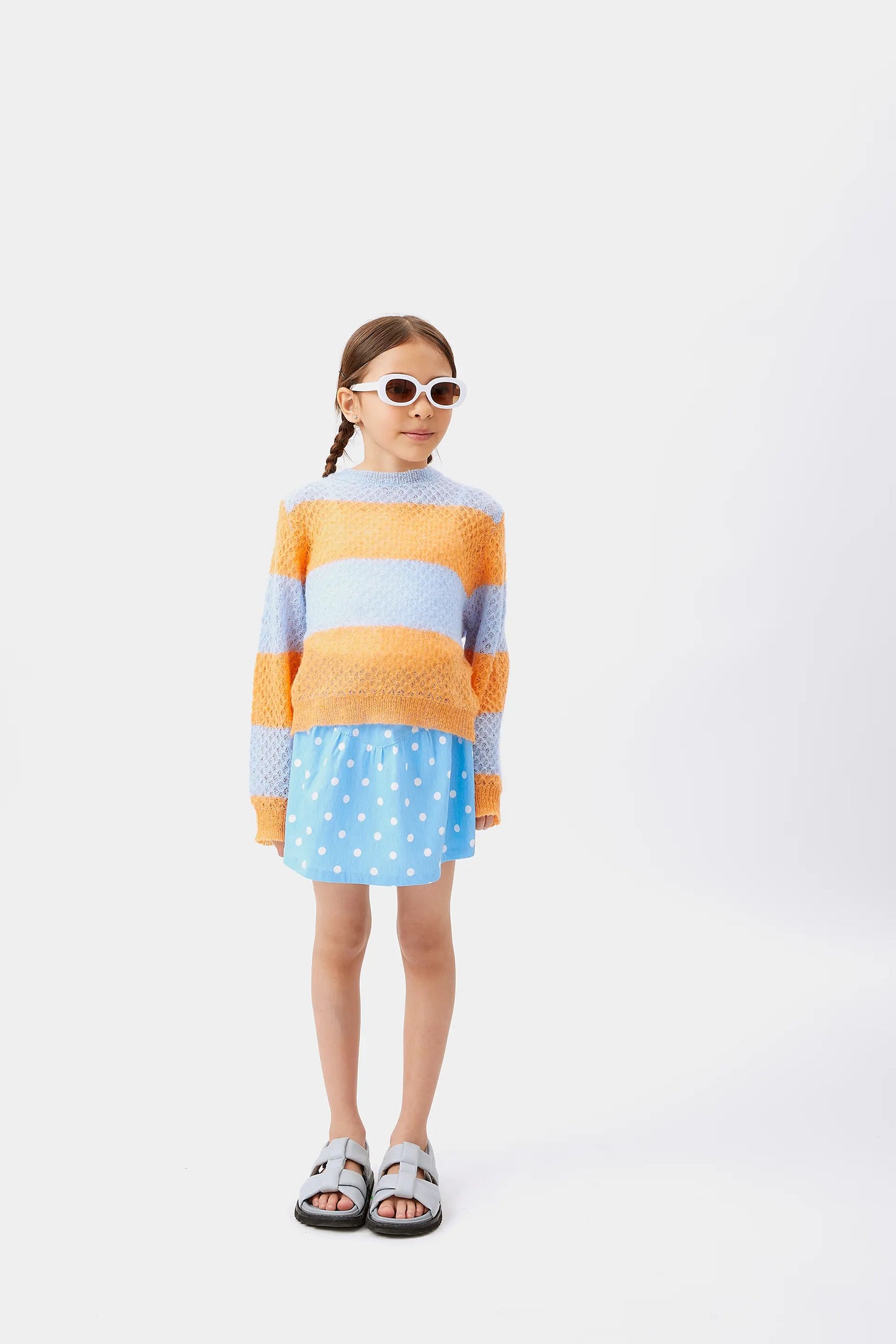 Jersey de niña punto trenzado rayas azul