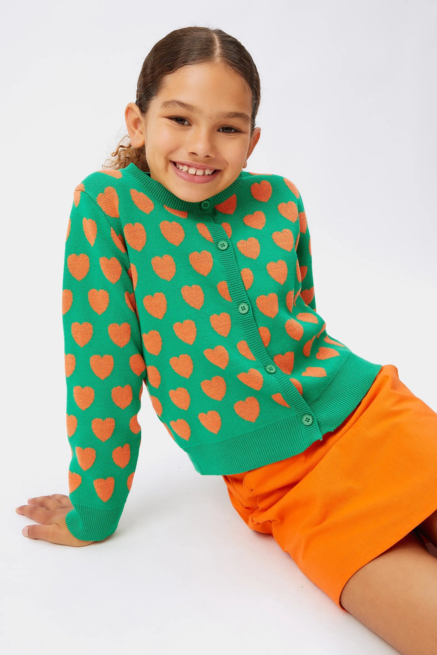 Girl's green hearts cardigan