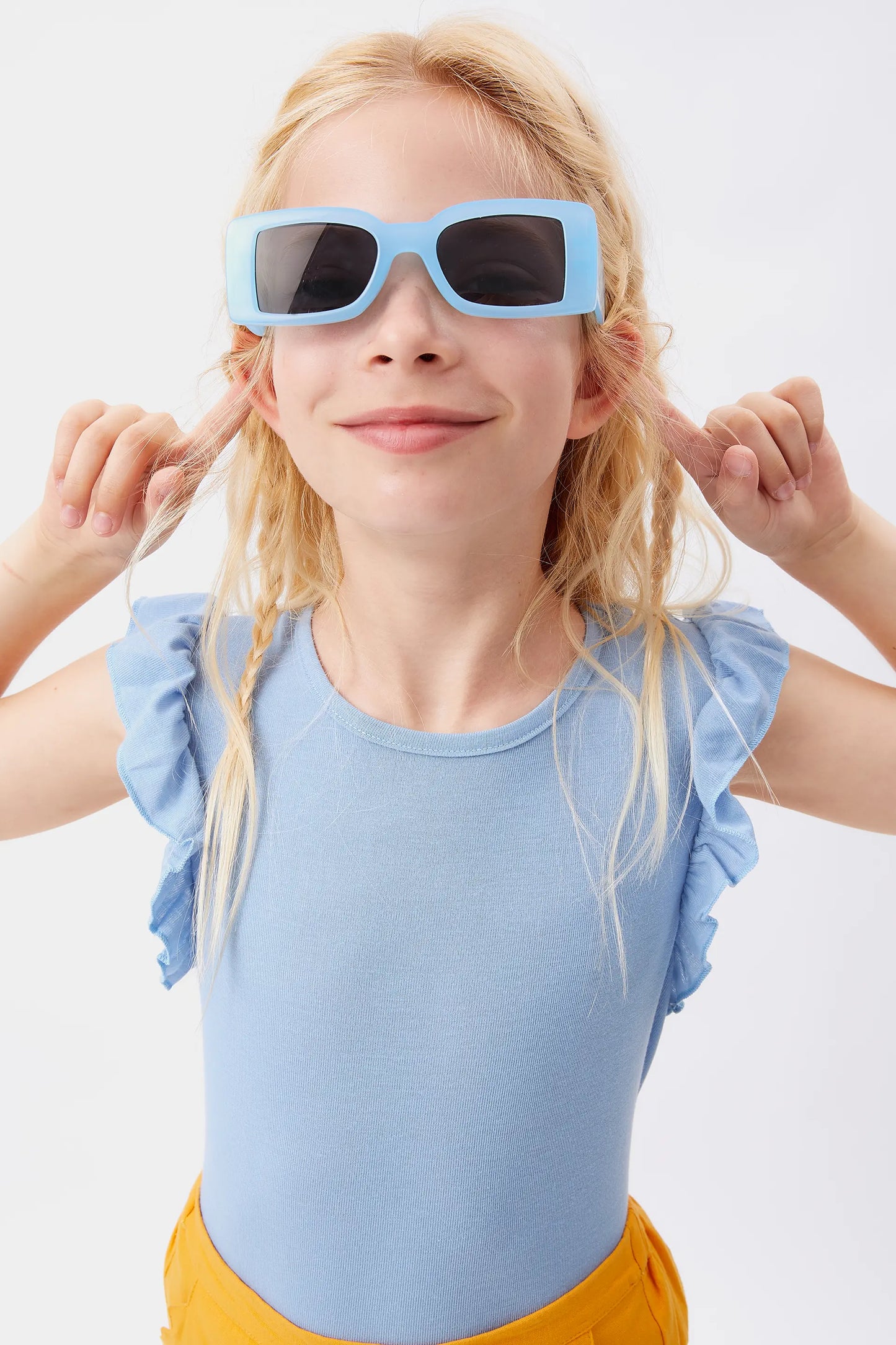 Top de niña con volantes azul