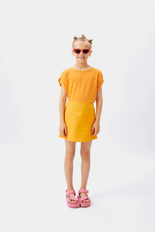 Top de niña manga corta drapeada amarillo