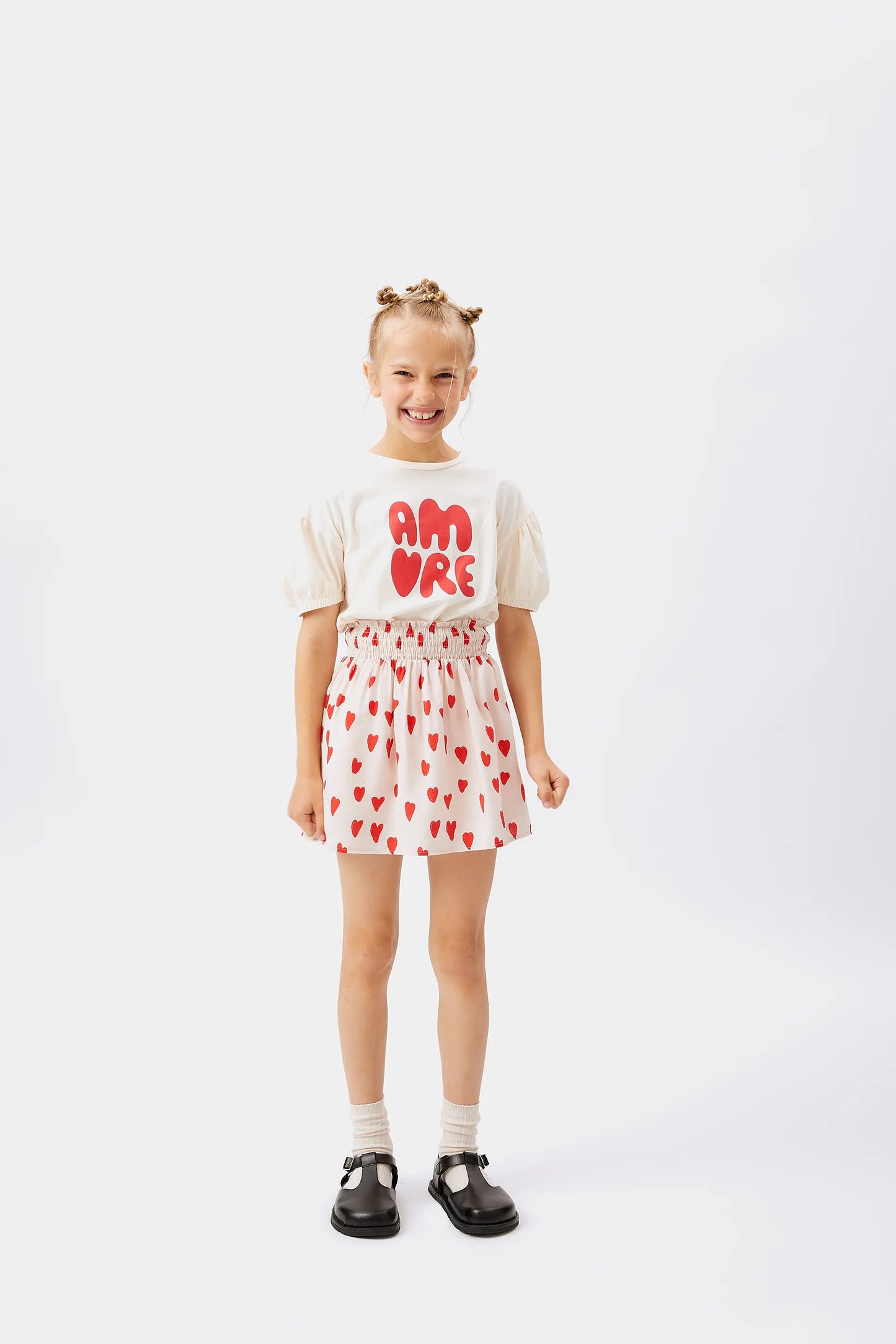 Girl's short skirt with heart print