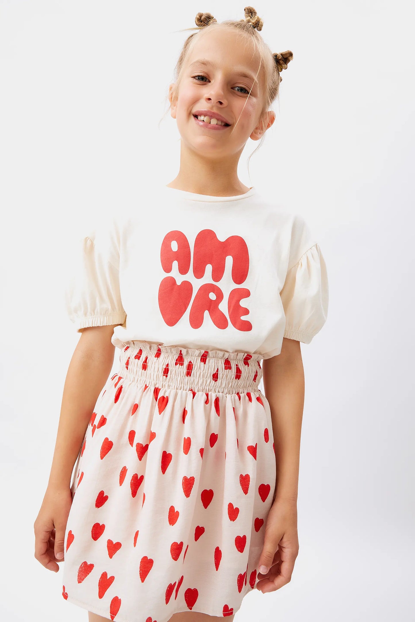 Girl's short skirt with heart print