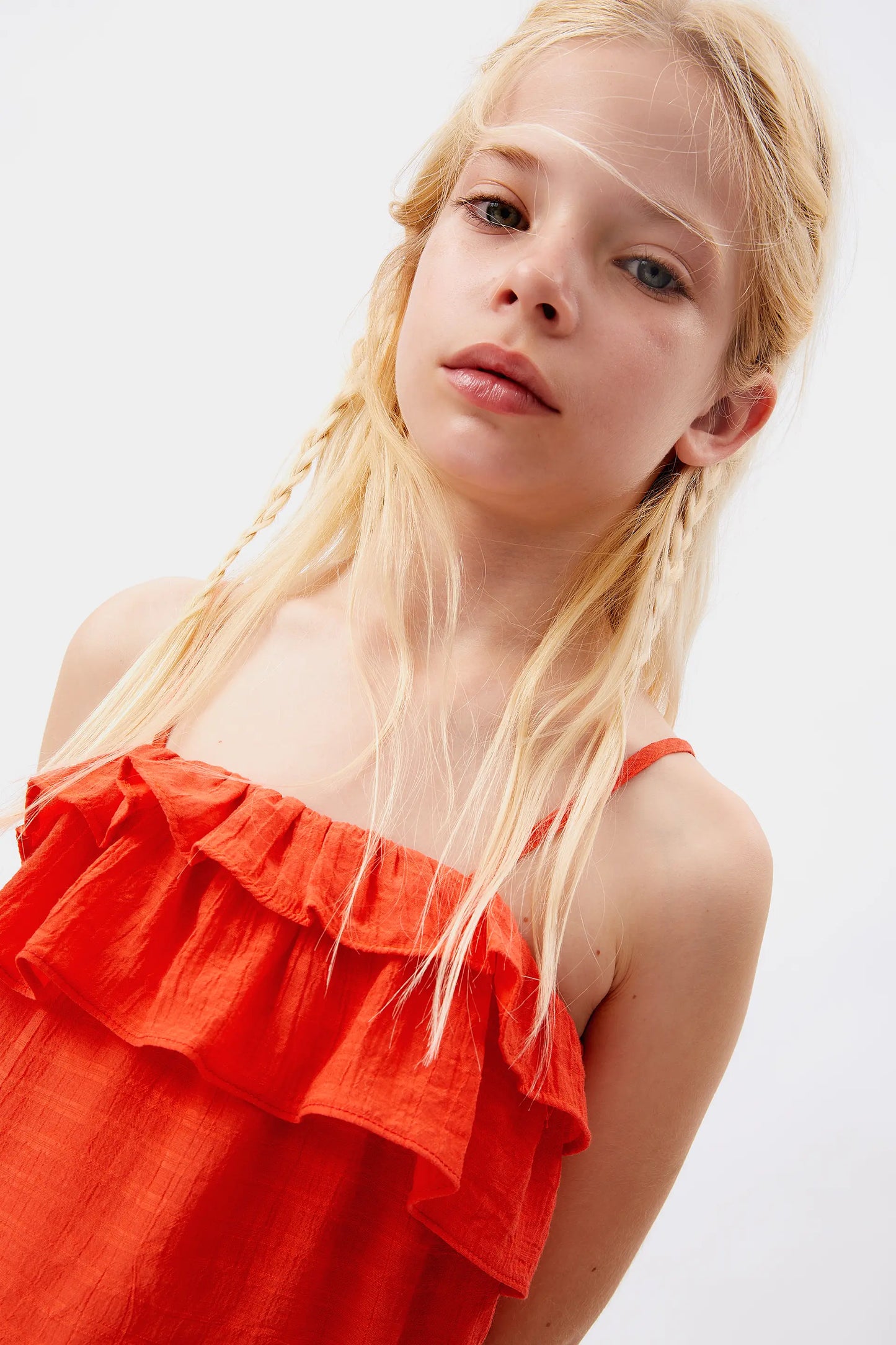 Top arancione senza spalline da bambina