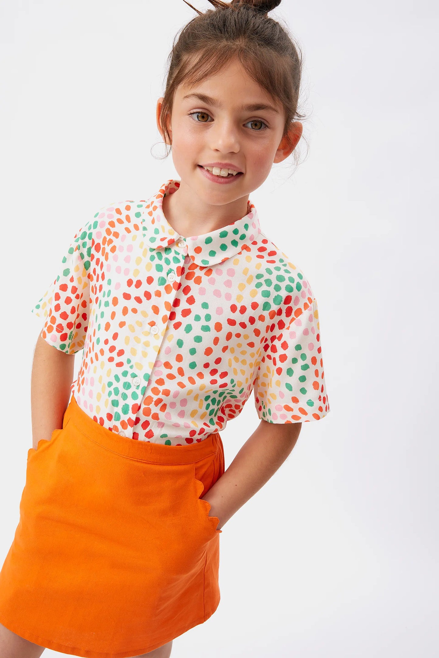 Falda corta de niña naranja