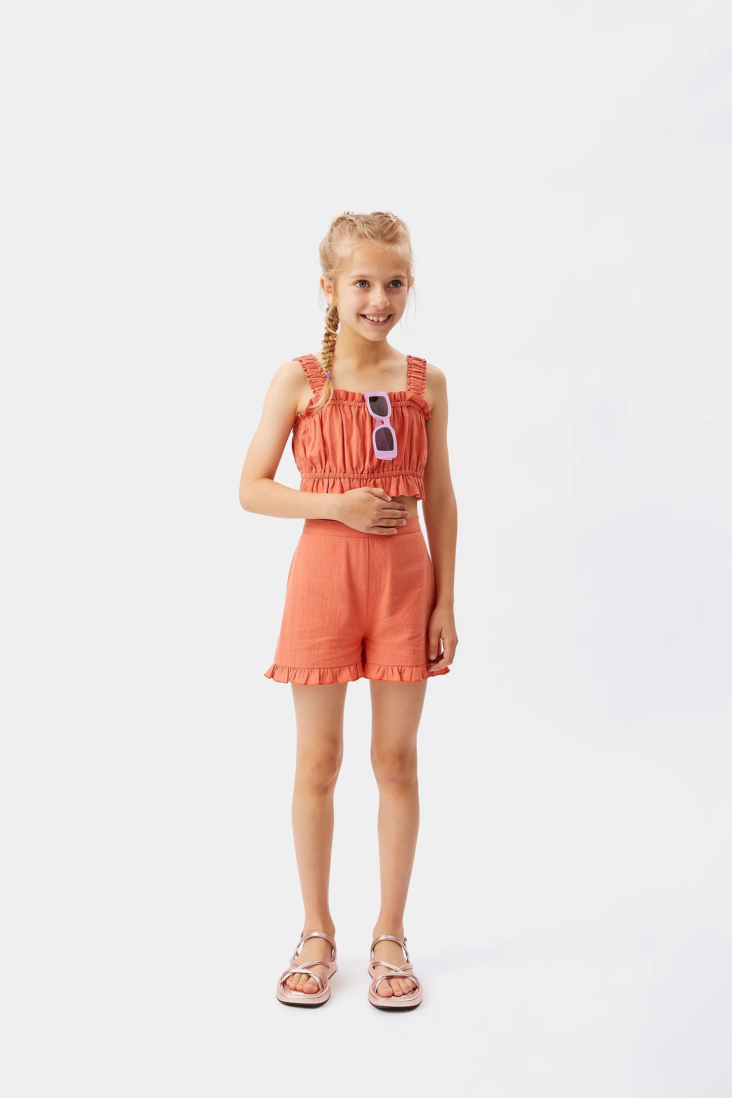 Girl's orange strapless crop top