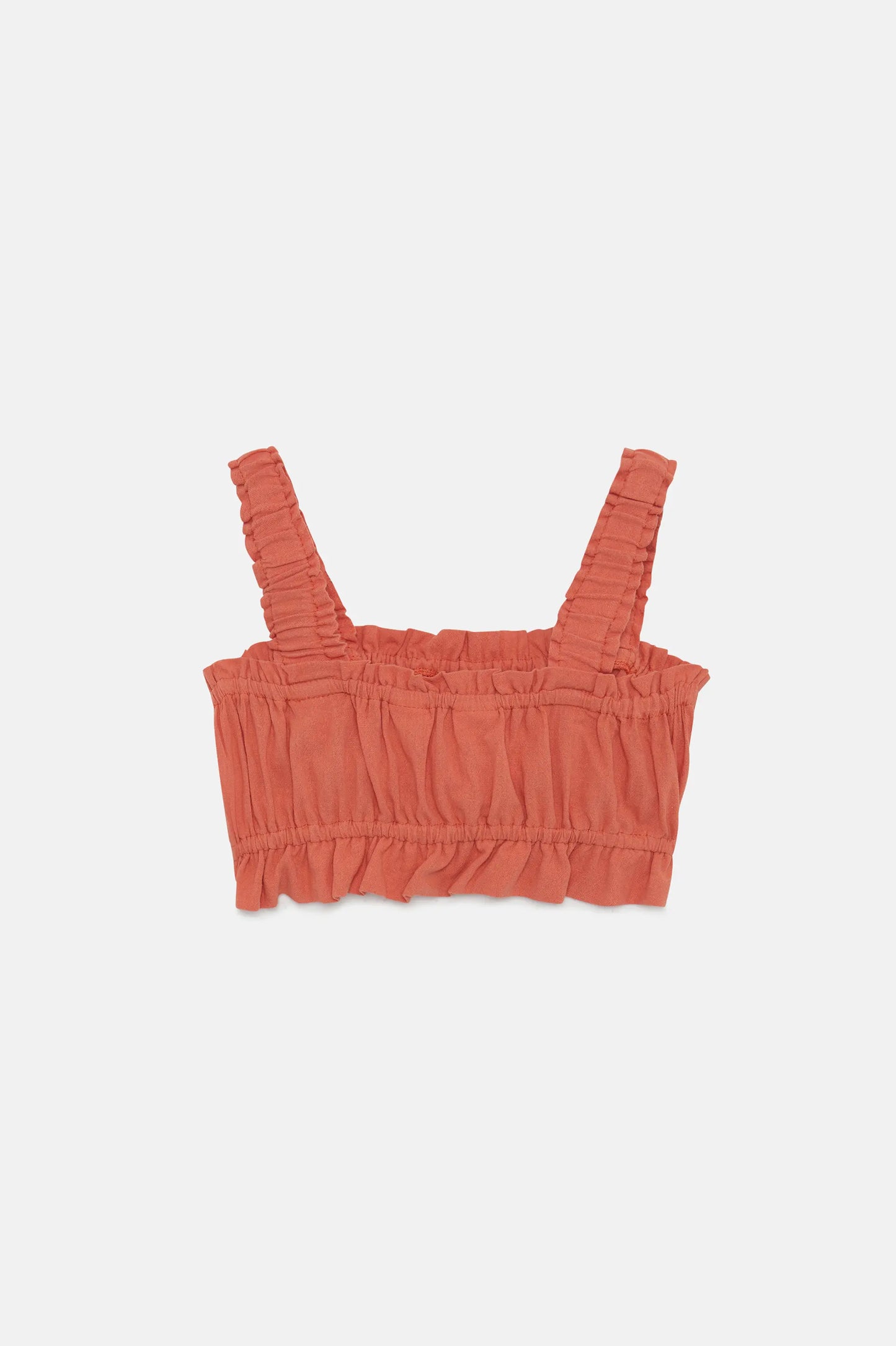 Girl's orange strapless crop top