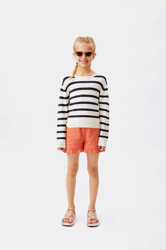 Shorts arancioni con volant da bambina