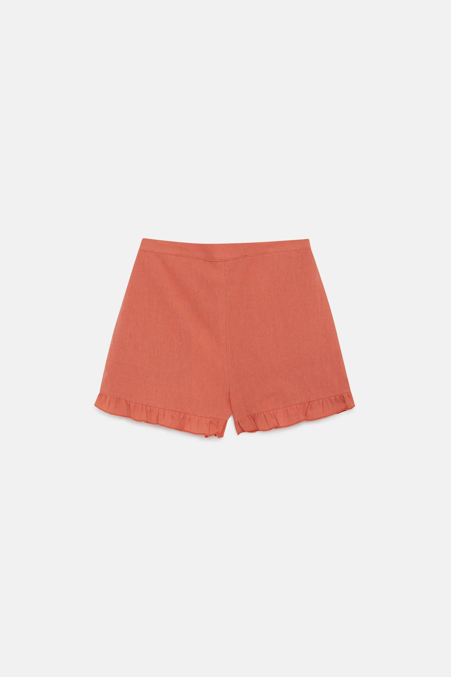 Shorts arancioni con volant da bambina