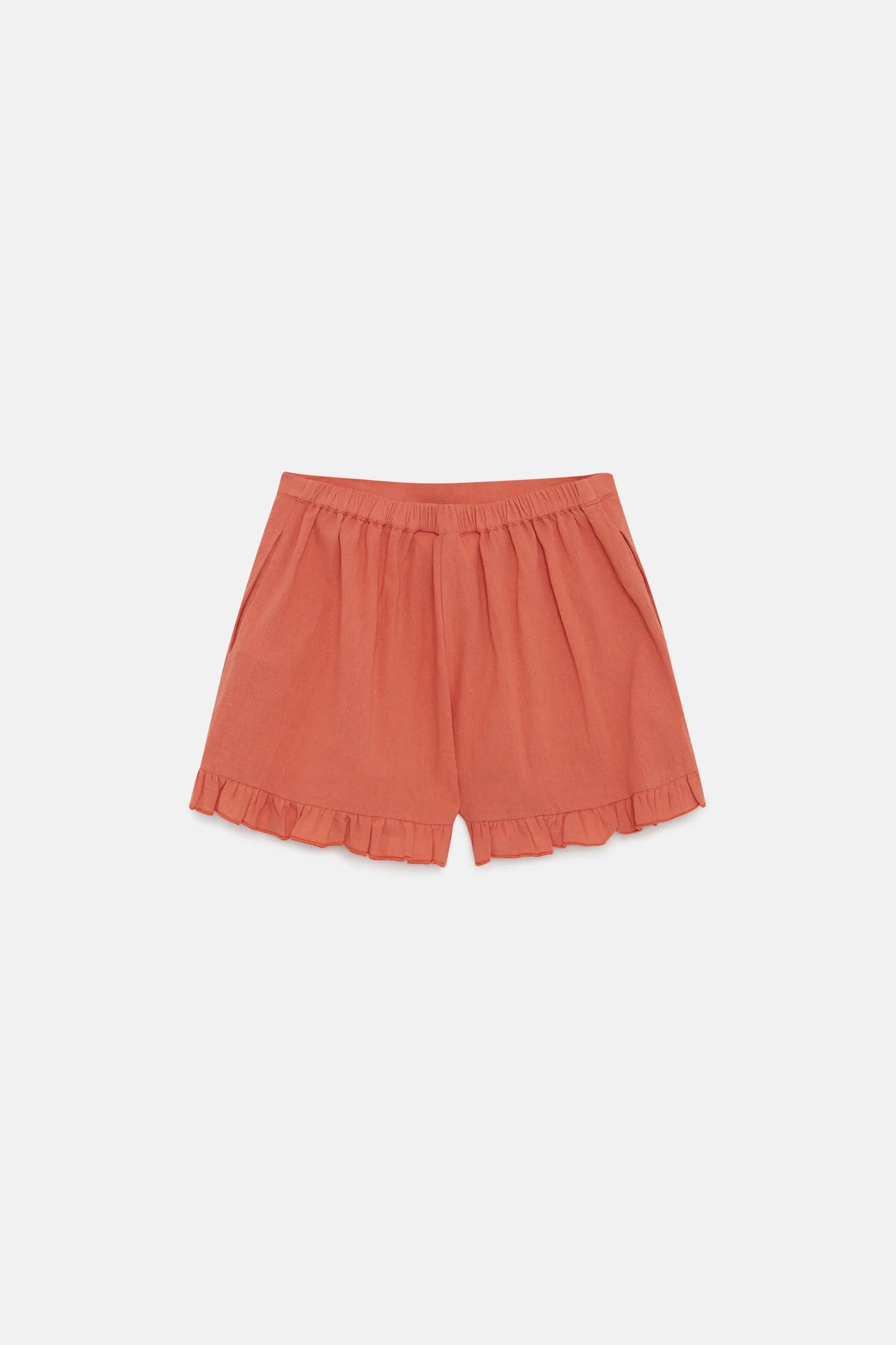 Shorts arancioni con volant da bambina