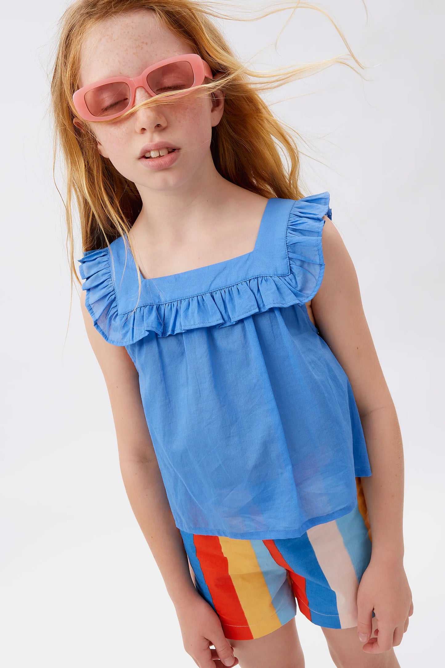Top de niña volantes azul