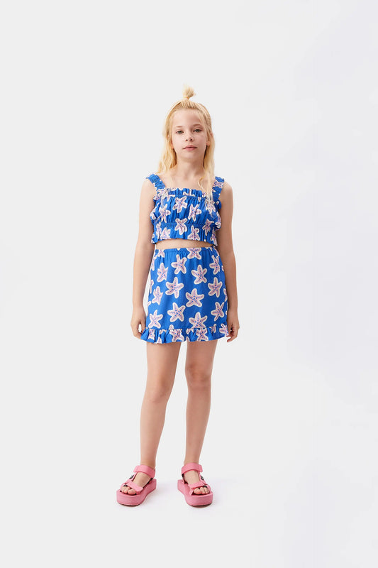 Falda corta de niña en rayón LENZING™ ECOVERO™ de estrellas