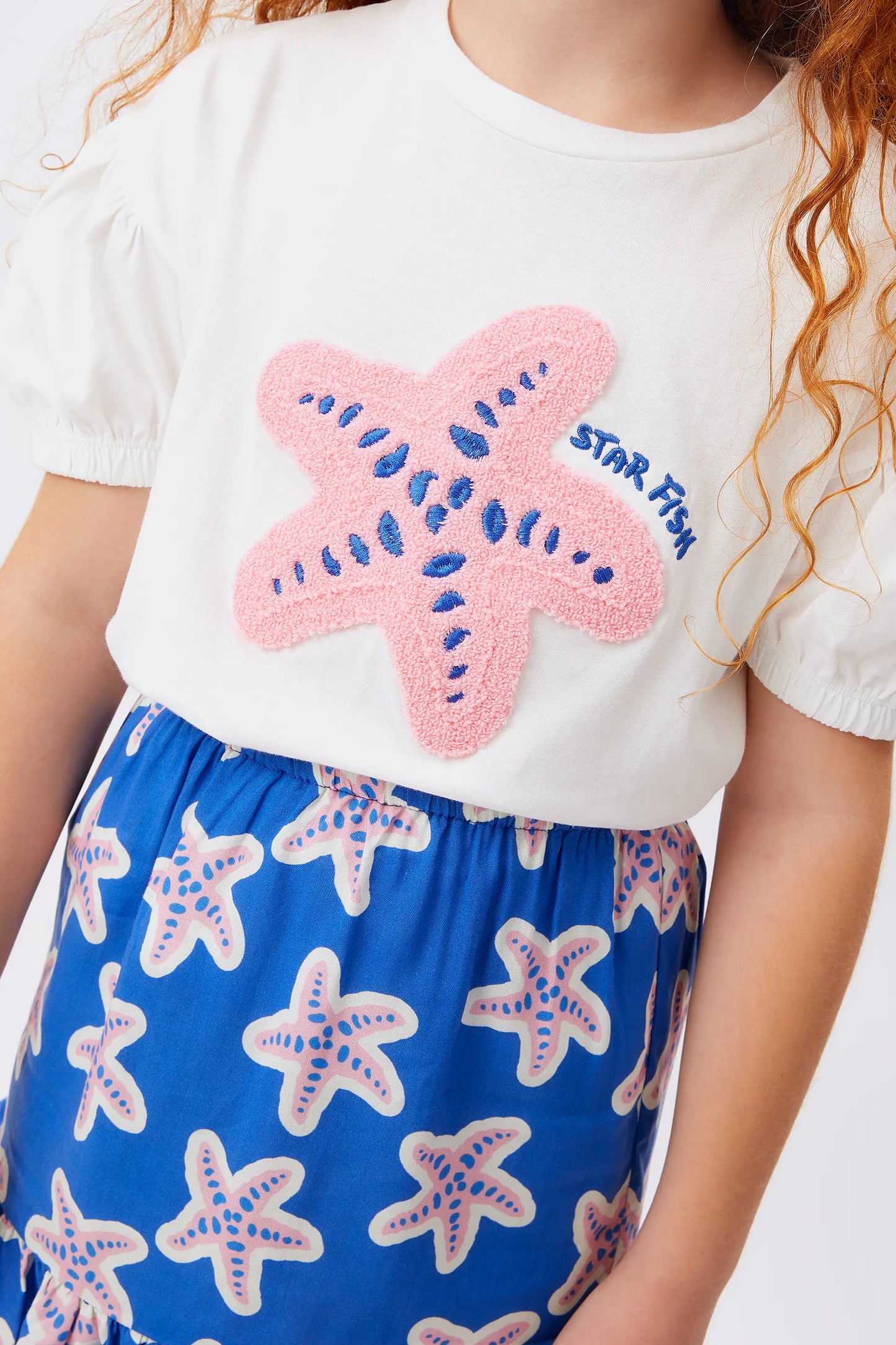 Camiseta unisex print estrella blanca