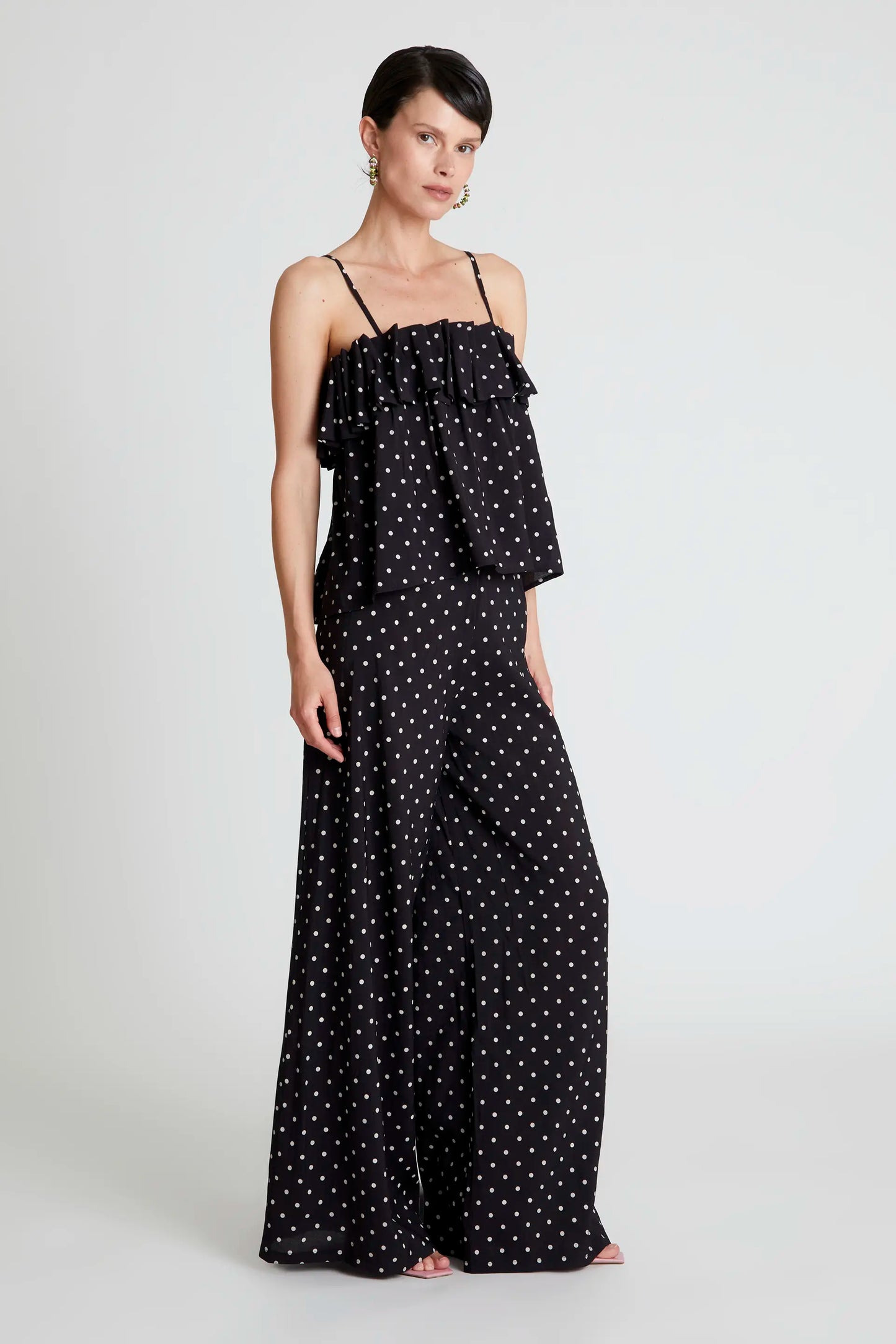 Top estampado de lunares negro