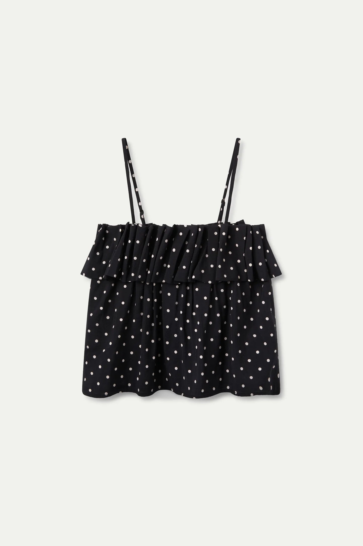 Top estampado de lunares negro