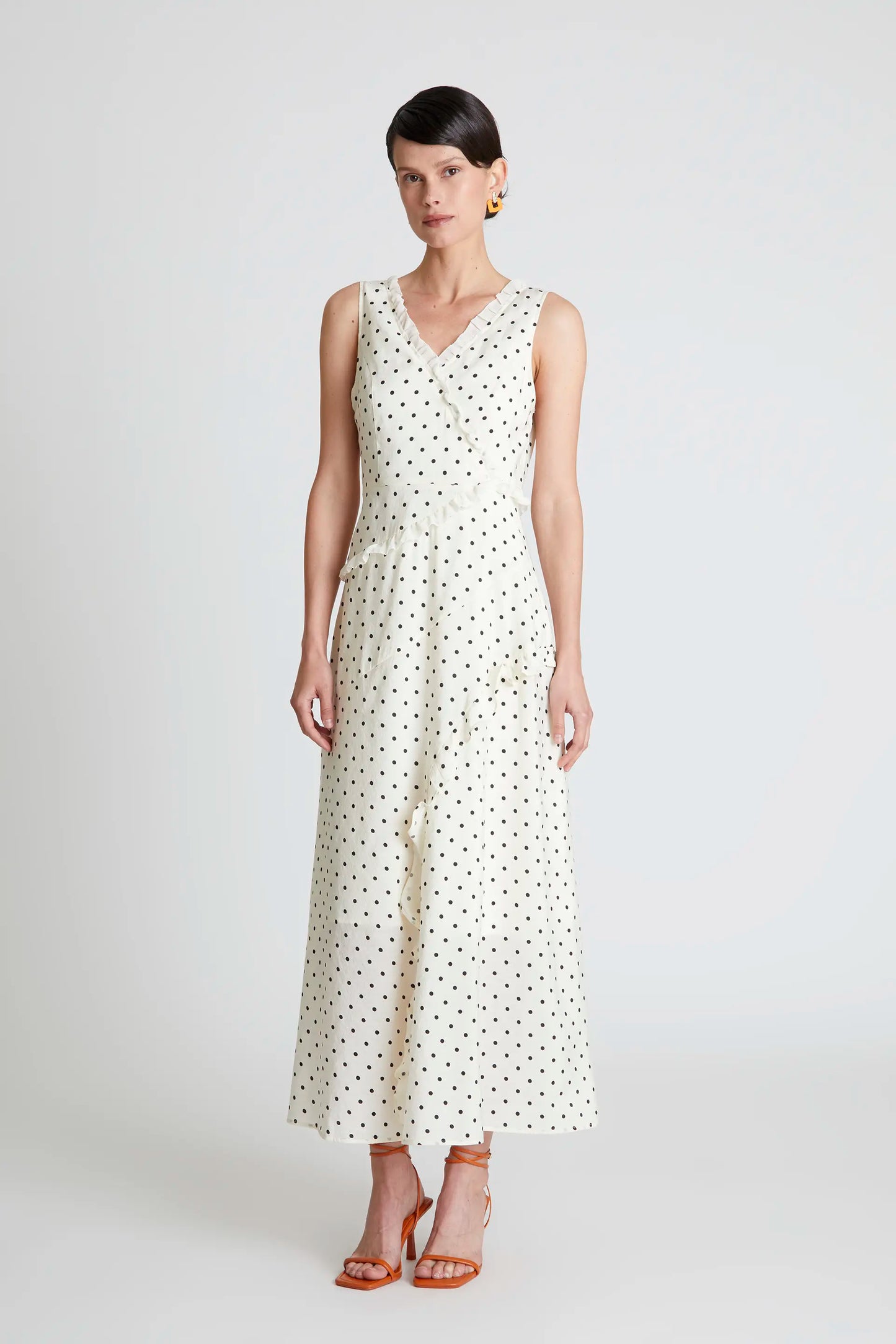 Long white polka dot ruffle dress