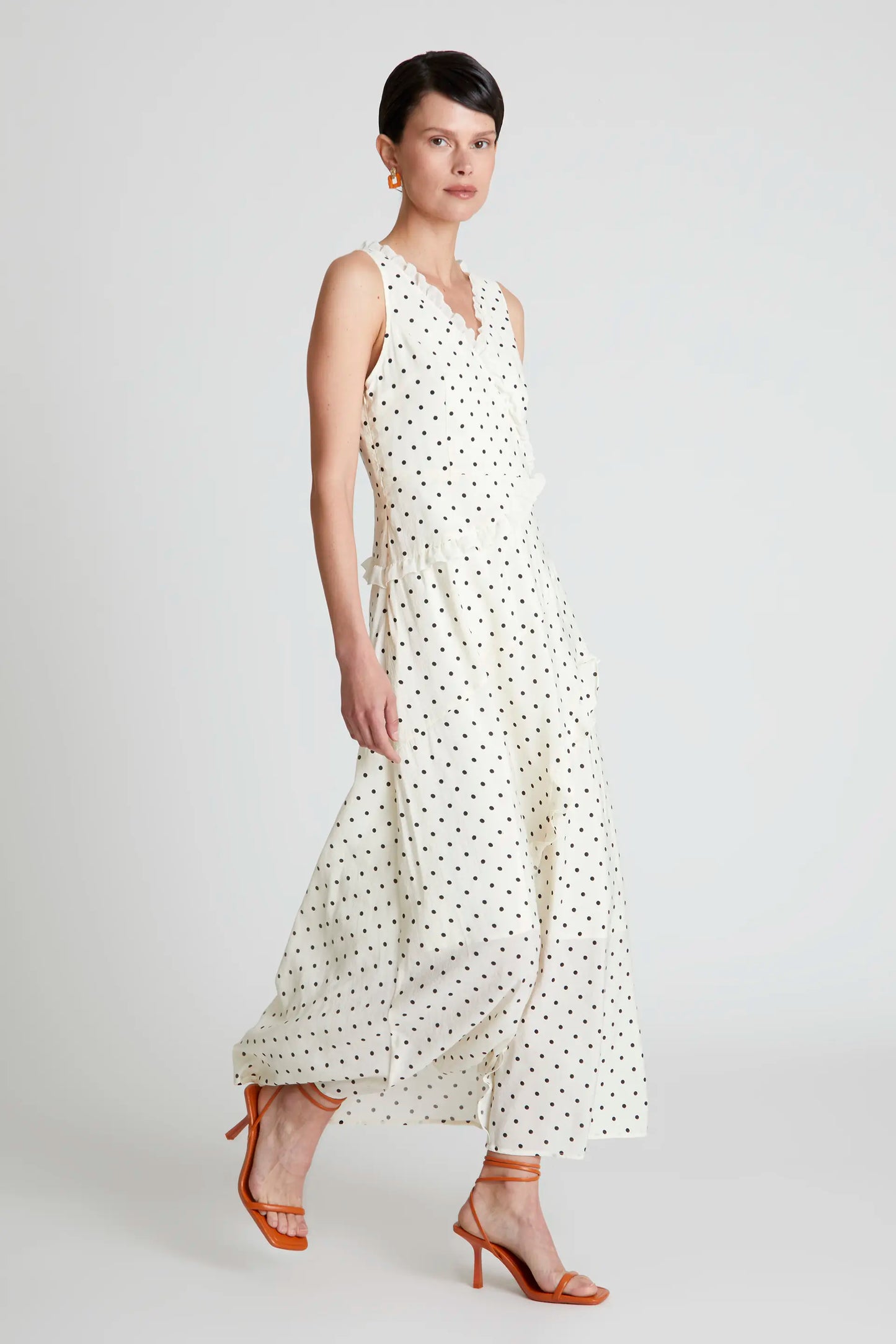 Long white polka dot ruffle dress