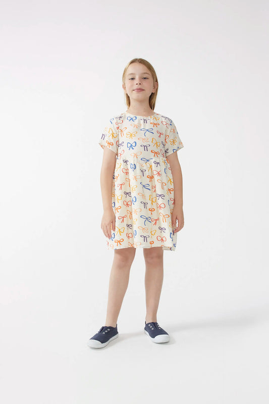 Vestido corto de niña estampado lazos