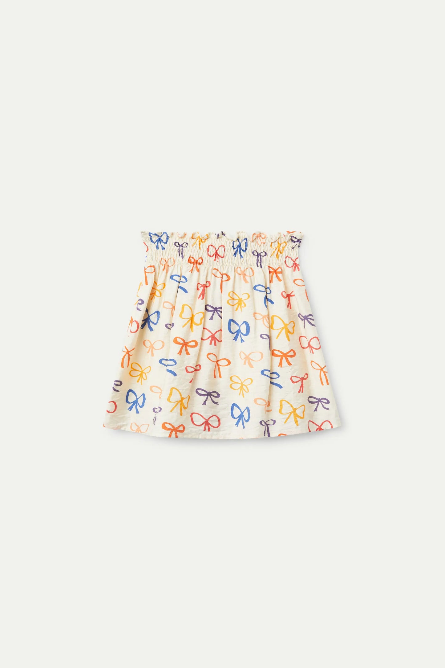 Falda corta de niña estampado lazos