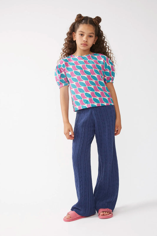 Top de niña estampado de plumas