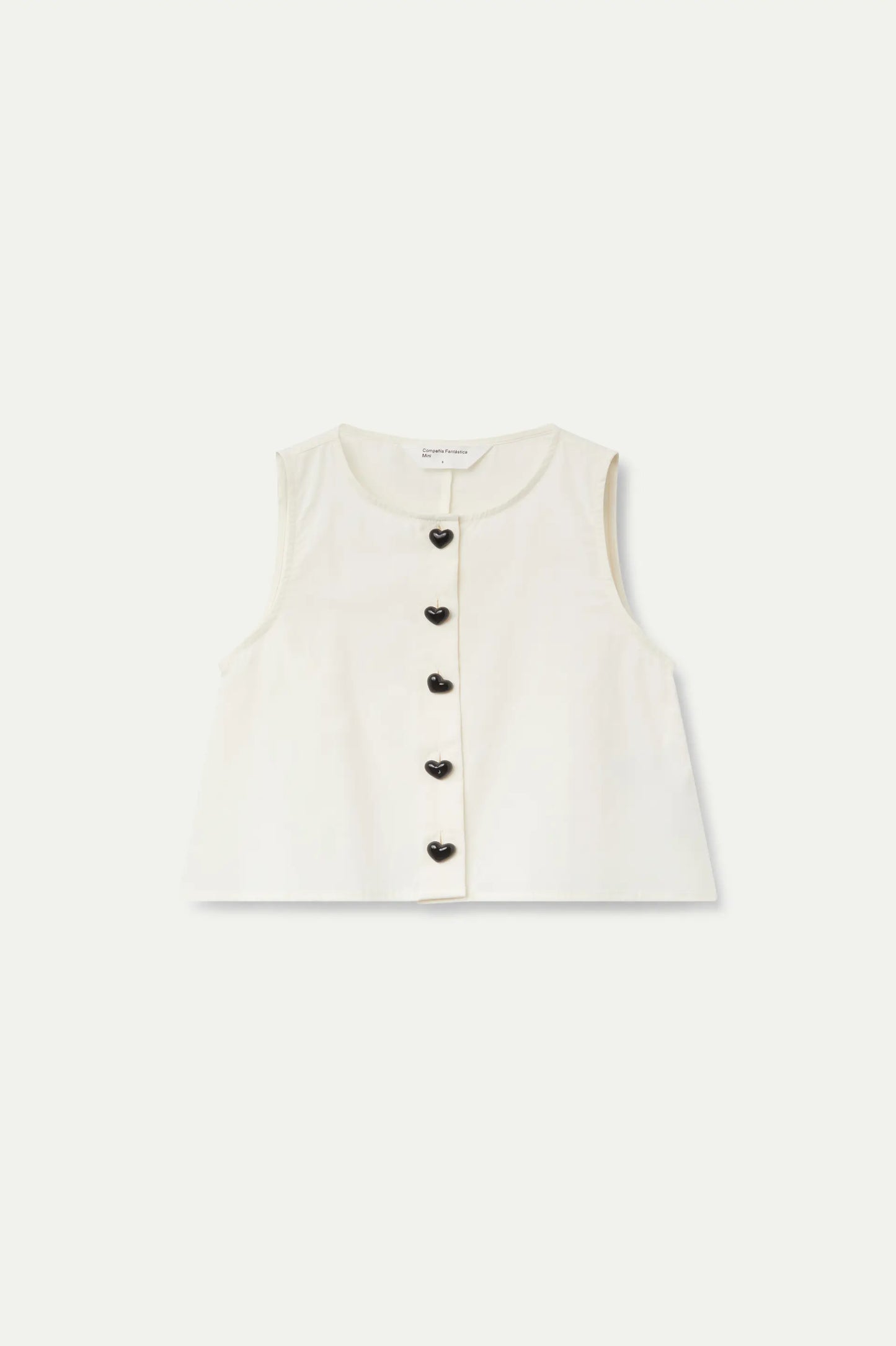 White buttoned girl's top