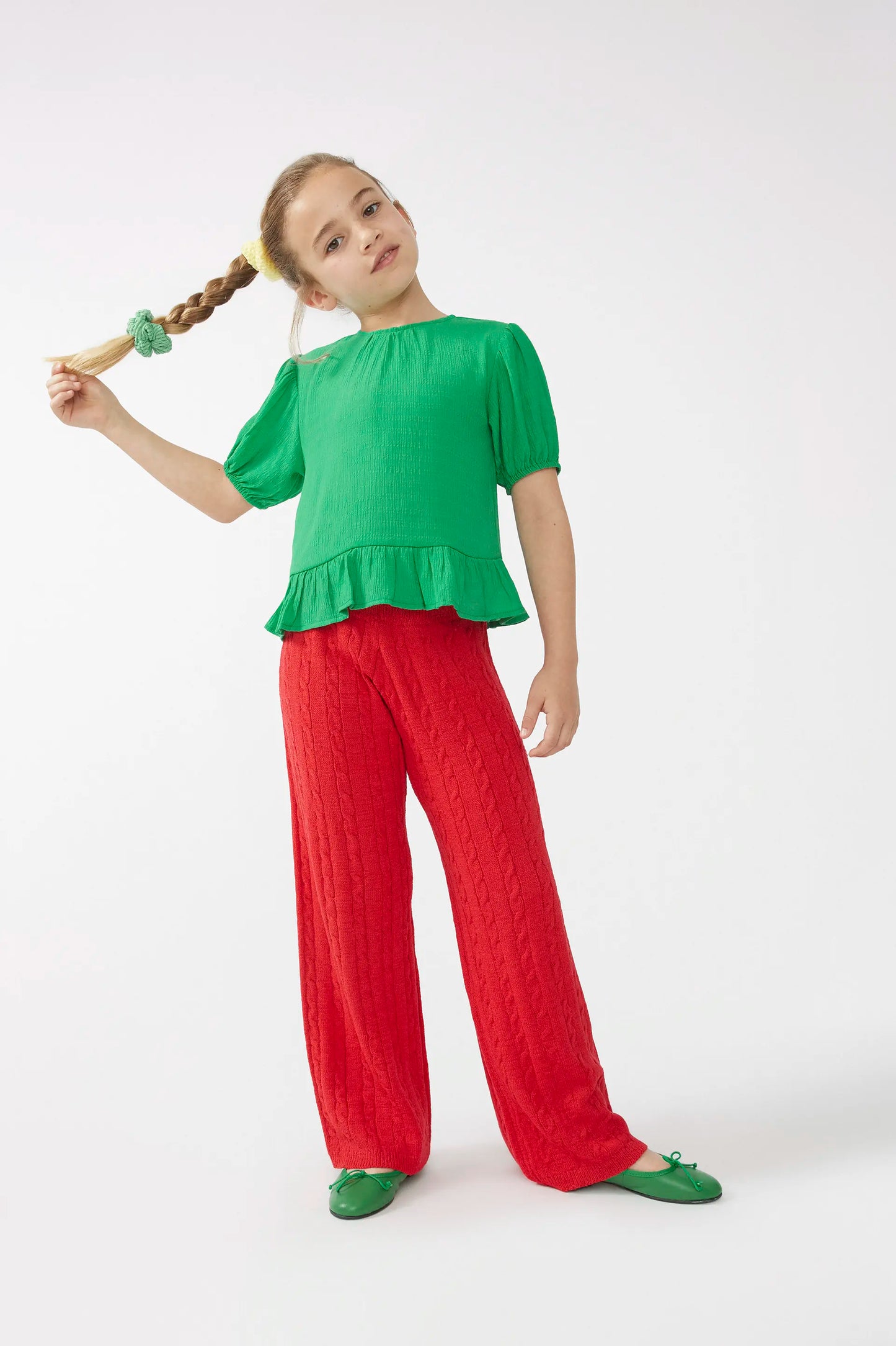 Green ruffled girl's top