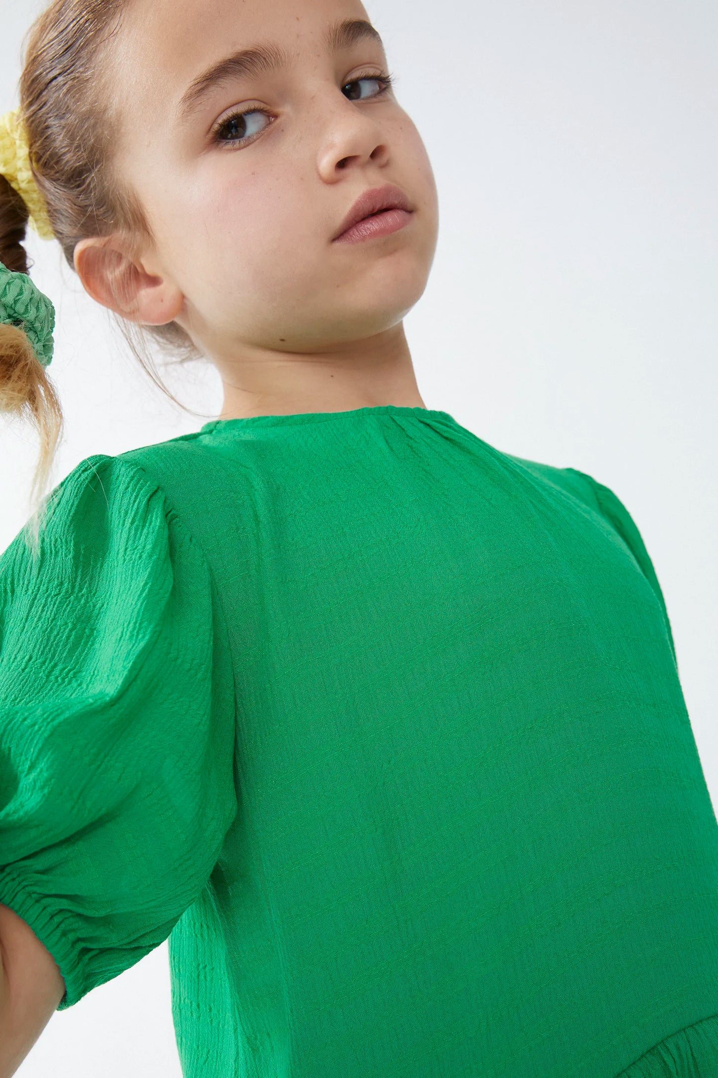 Green ruffled girl's top