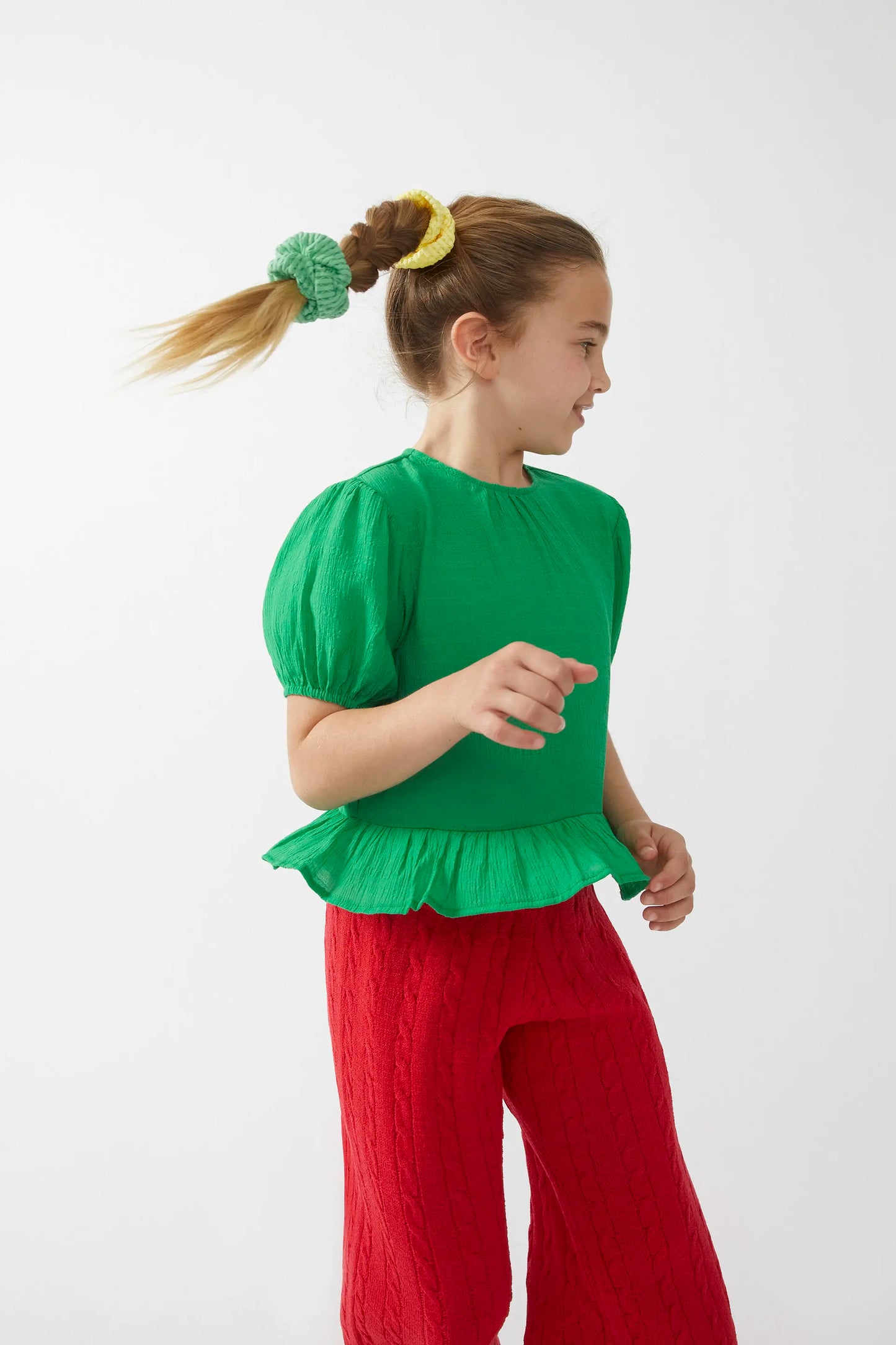 Green ruffled girl's top