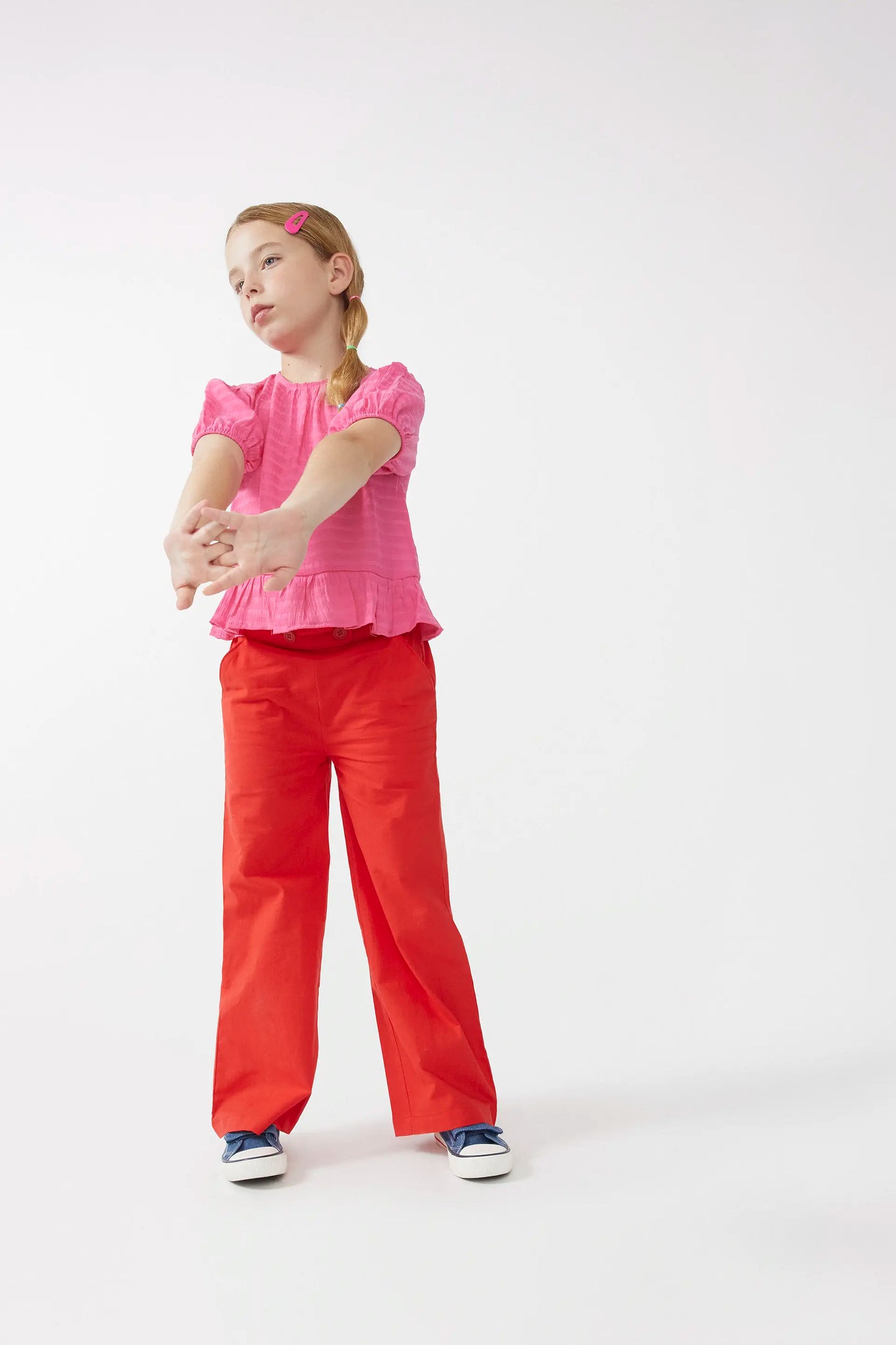 Pink ruffled girl's top